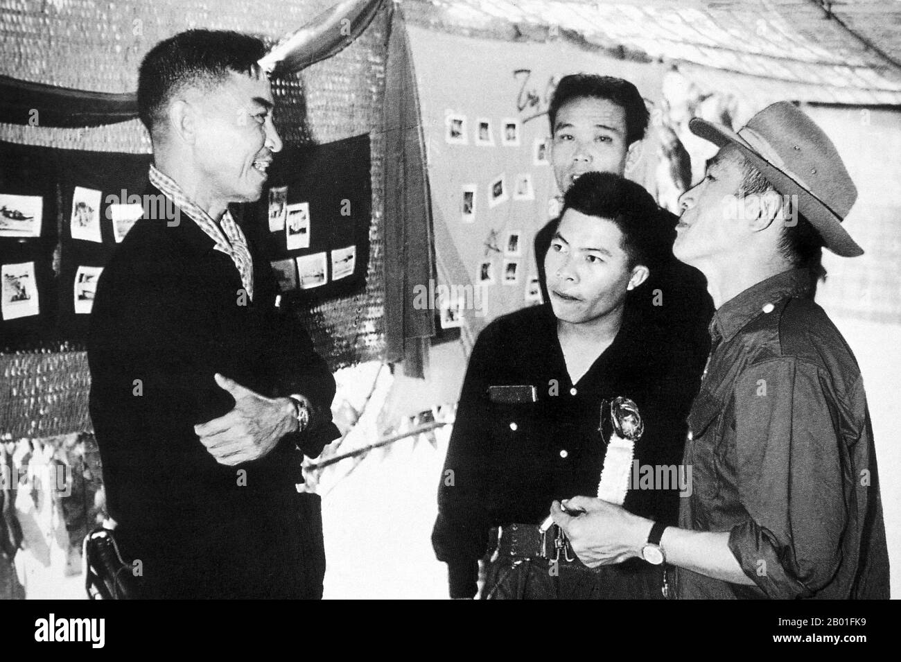 Vietnam: Huynh Tan Phat, President of the National Liberation Front (NLF or 'Viet Cong', talking to journalists at Cu Chi, 1962.  The Second Indochina War, known in America as the Vietnam War, was a Cold War era military conflict that occurred in Vietnam, Laos, and Cambodia from 1 November 1955 to the fall of Saigon on 30 April 1975. This war followed the First Indochina War and was fought between North Vietnam, supported by its communist allies, and the government of South Vietnam, supported by the U.S. and other anti-communist nations. Stock Photo
