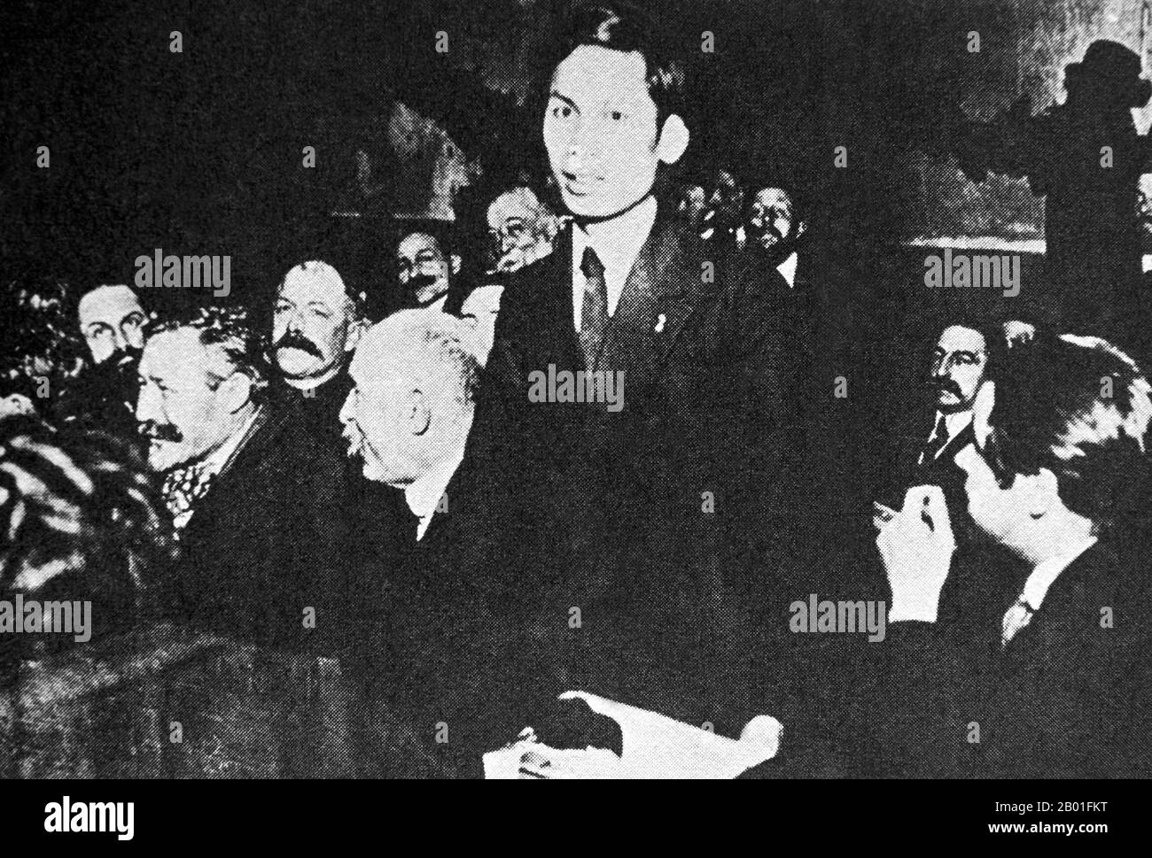 Vietnam/France: A young Ho Chi Minh (19 May 1890 - 3 September 1969) at the French Socialist Party Congress, 1920.  Hồ Chí Minh, born Nguyễn Sinh Cung and also known as Nguyễn Ái Quốc was a Vietnamese Communist revolutionary leader who was prime minister (1946-1955) and president (1945-1969) of the Democratic Republic of Vietnam (North Vietnam).  He formed the Democratic Republic of Vietnam in 1945 and led the Viet Cong during the Vietnam War until his death. Hồ led the Viet Minh independence movement from 1941 onward, though lost political power in the late 1950s, remaining as a figurehead. Stock Photo