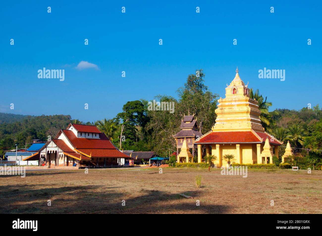 Thailand: Ancient viharn and chedi at Wat Si Pho Chai Na Phung, Na Haeo District, Loei Province.  Loei (Thai: เลย) Province is located in Thailand's upper North-East. Neighboring provinces are (from east clockwise) Nong Khai, Udon Thani, Nongbua Lamphu, Khon Kaen, Phetchabun, Phitsanulok. In the north it borders Xaignabouli and Vientiane Provinces of Laos.  The province is covered with low mountains, while the capital Loei is located in a fertile basin. The Loei River, which flows through the province, is a tributary of the Mekong. Stock Photo