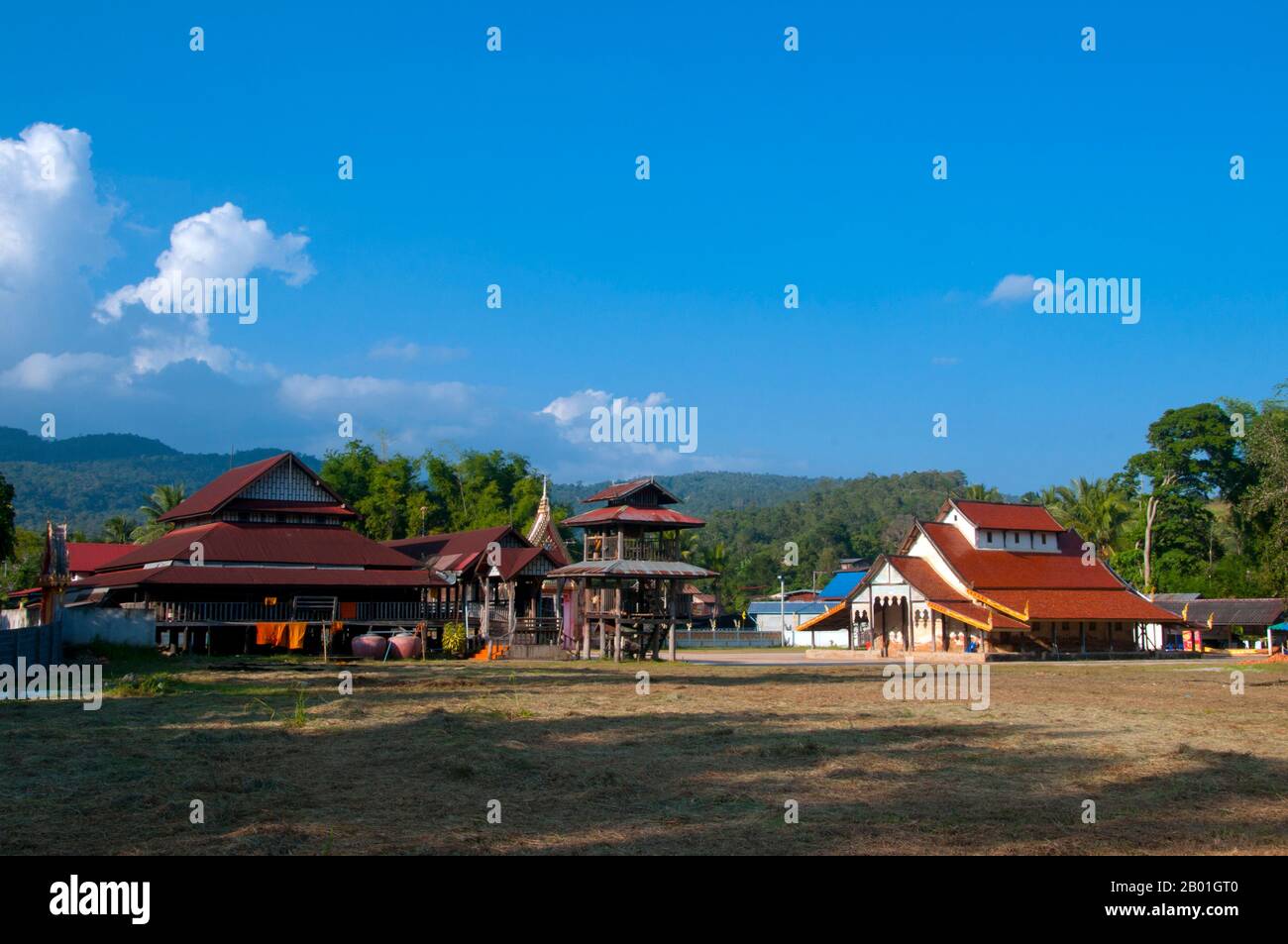 Thailand: Old wooden sala, bell tower and viharn at Wat Si Pho Chai Na Phung, Na Haeo District, Loei Province.  Loei (Thai: เลย) Province is located in Thailand's upper North-East. Neighboring provinces are (from east clockwise) Nong Khai, Udon Thani, Nongbua Lamphu, Khon Kaen, Phetchabun, Phitsanulok. In the north it borders Xaignabouli and Vientiane Provinces of Laos.  The province is covered with low mountains, while the capital Loei is located in a fertile basin. The Loei River, which flows through the province, is a tributary of the Mekong. Stock Photo