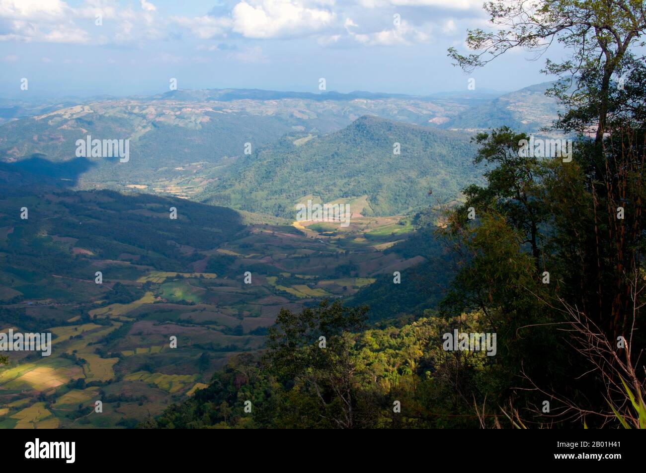 Thailand: View from Lon Noi Cliff, Phu Ruea National Park, Loei Province.  Loei (Thai: เลย) Province is located in Thailand's upper North-East. Neighboring provinces are (from east clockwise) Nong Khai, Udon Thani, Nongbua Lamphu, Khon Kaen, Phetchabun, Phitsanulok. In the north it borders Xaignabouli and Vientiane Provinces of Laos.  The province is covered with low mountains, while the capital Loei is located in a fertile basin. The Loei River, which flows through the province, is a tributary of the Mekong. Stock Photo