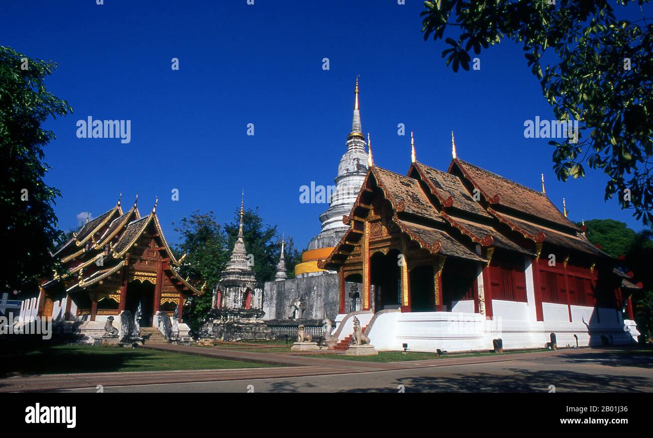 Thailand: Viharn Lai Kam (left), the main chedi and ubosot, Wat Phra Singh, Chiang Mai, Northern Thailand.  Wat Phra Singh or to give it its full name, Wat Phra Singh Woramahaviharn, was first constructed around 1345 by King Phayu, 5th king of the Mangrai Dynasty.  King Mengrai founded the city of Chiang Mai (meaning 'new city') in 1296, and it succeeded Chiang Rai as capital of the Lanna kingdom. Chiang Mai, sometimes written as 'Chiengmai' or 'Chiangmai', is the largest and most culturally significant city in northern Thailand. Stock Photo