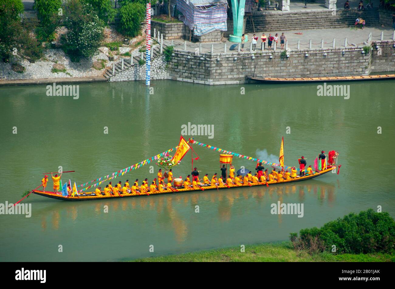 China: Ceremonial boat on the Li River from Fubo Shan (Wave-Subduing Hill), Guilin, Guangxi Province.  Guilin's Dragon Boat Festival is held on the fifth day of the fifth month (May) of the Chinese lunar calendar every 3 years. The festival was originally held in memory of the great Chinese poet, Quyuan.  The name Guilin means ‘Cassia Woods’ and is named after the osmanthus (cassia) blossoms that bloom throughout the autumn period.  Guilin is the scene of China’s most famous landscapes, inspiring thousands of paintings over many centuries. Stock Photo