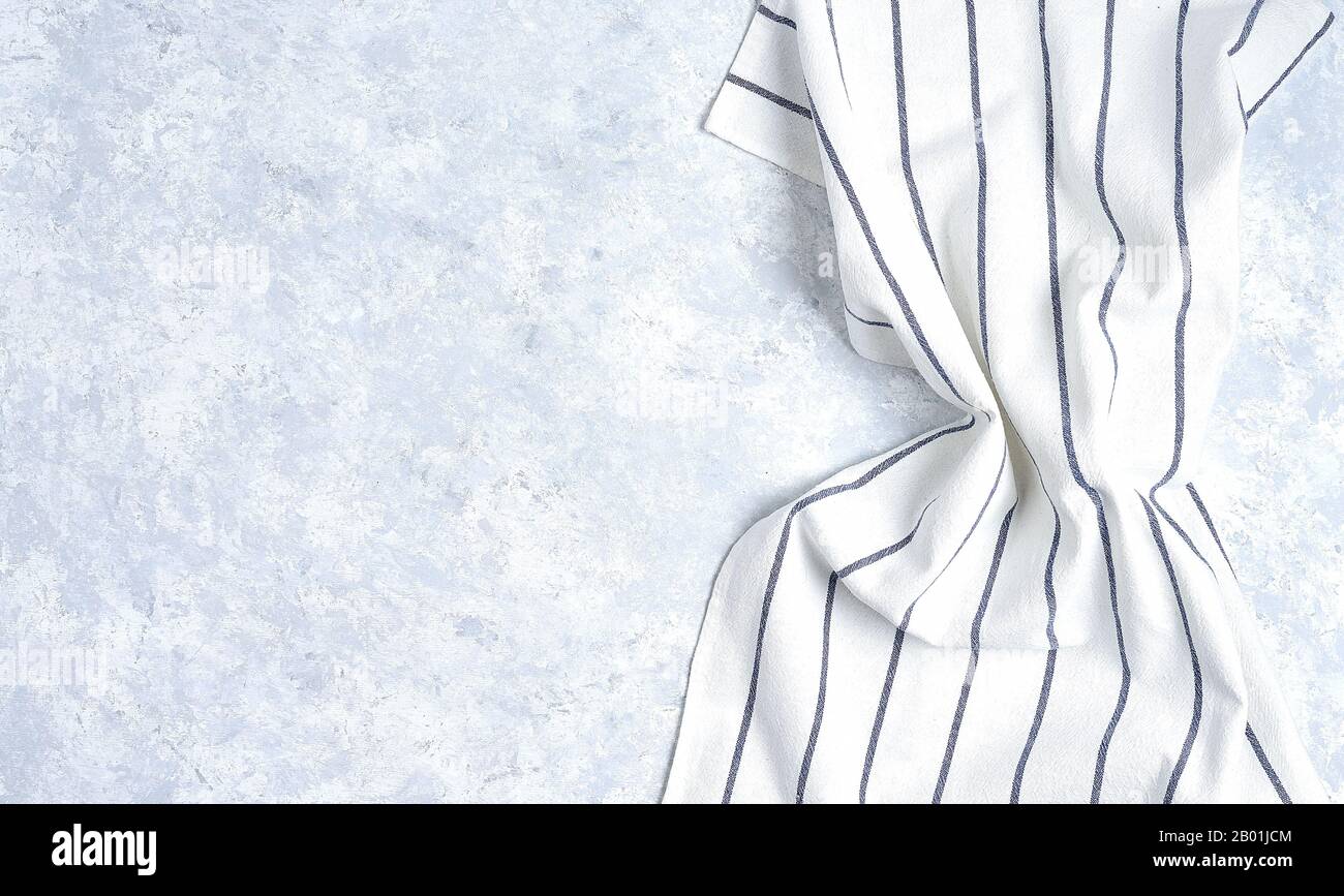 striped kitchen towel, isolated on white background Stock Photo