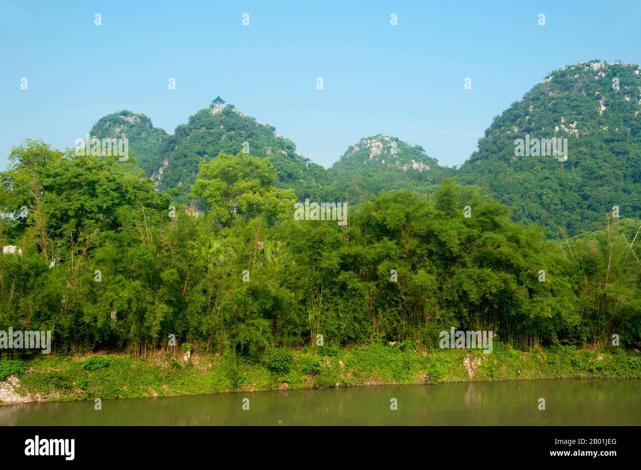 China: Qixing Gongyuan (Seven Star Park).  Qixing Gongyuan or Seven Star Park gained its name from the position of its seven hills, which suggest the pattern of the Plough (Big Dipper) constellation. The park has been a tourist attraction for more than 1,000 years.  The name Guilin means ‘Cassia Woods’ and is named after the osmanthus (cassia) blossoms that bloom throughout the autumn period. Guilin is the scene of China’s most famous landscapes, inspiring thousands of paintings over many centuries. They are often called the ‘finest mountains and rivers under heaven’. Stock Photo