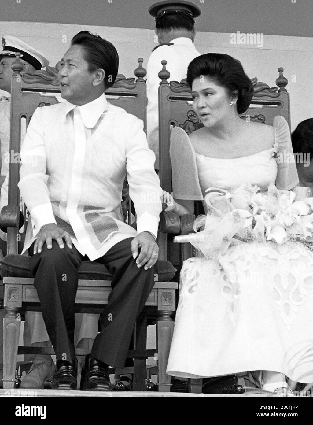 Philippines: President Ferdinand Marcos and First Lady Imelda Marcos at Clark Air Force Base, Luzon, 14 March 1979.  Ferdinand Emmanuel Edralin Marcos (11 September 1917 - 28 September 1989) was the 10th President of the Philippines from 1965 to 1986. He was a lawyer, member of the Philippine House of Representatives (1949-1959) and a member of the Philippine Senate (1959-1965).  In 1983, his government was implicated in the assassination of his primary political opponent, Benigno Aquino, Jr. The implication caused a chain of events that eventually led to Marcos' removal from power in 1986. Stock Photo