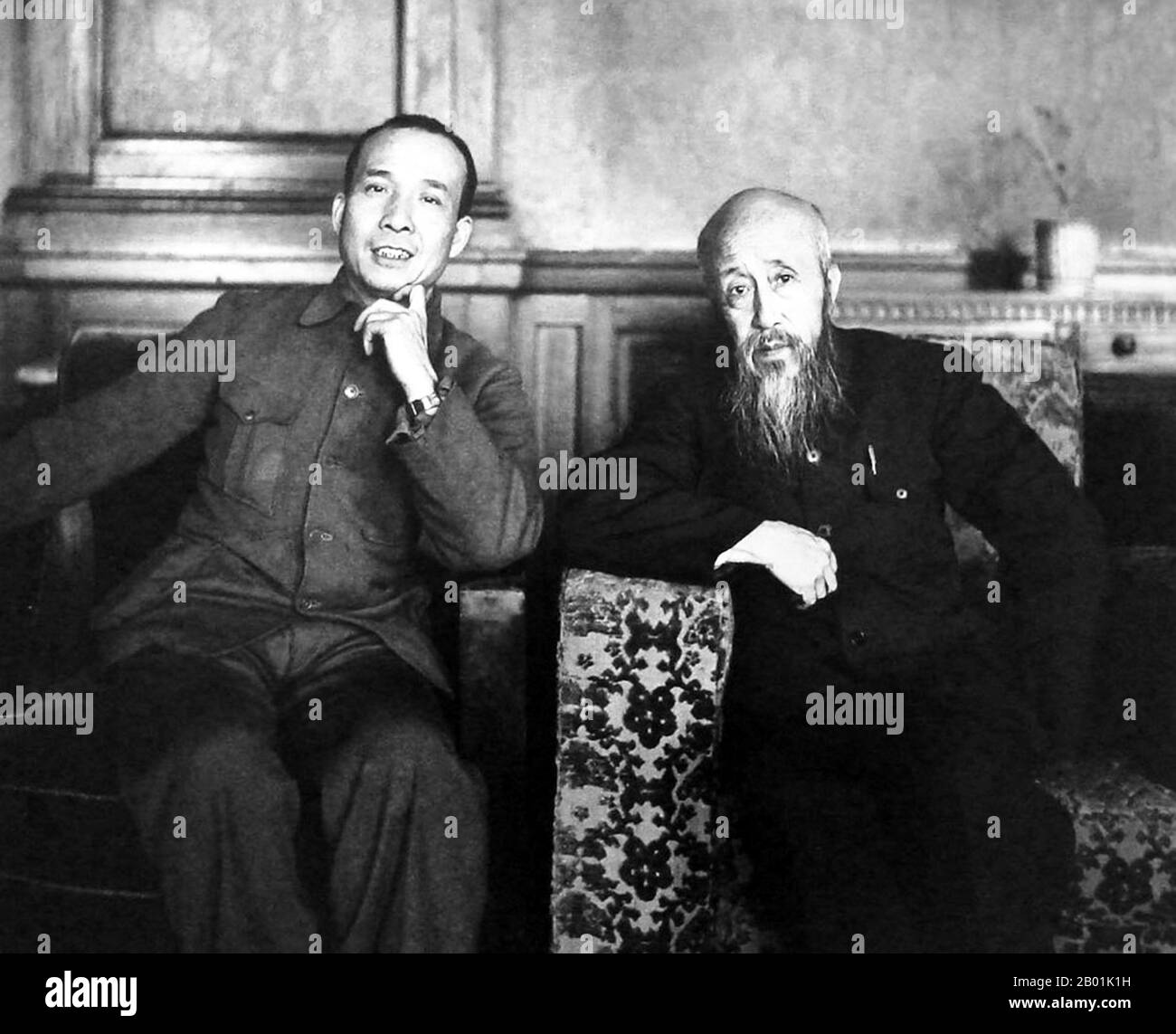 China: Zhou Haiying (27 September 1929 - 7 April 2011, left), the son of celebrated Chinese writer Lu Xun, together with Shen Junru (2 January 1875 - 11 June 1963), first President of the Supreme People's Court of China, Shenyang, 1949.  Shen Junru was a Chinese lawyer, political figure and the first President of the Supreme People's Court of China in the People's Republic of China.  He was born in Suzhou, Jiangsu Province, with family ancestry in Jiaxing, Zhejiang Province during the late Qing Dynasty. He received the Jinshi or 'presented scholar' degree, the highest under the imperial exams. Stock Photo
