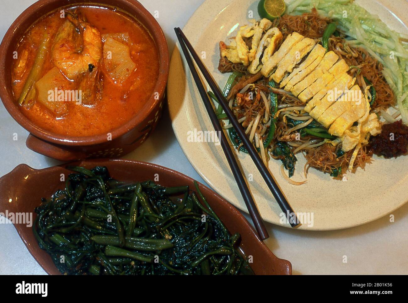 Malaysia/Thailand: Typical Nonya cuisine found in Melaka, Penang and Phuket.  Peranakan Chinese and Baba-Nyonya are terms used for the descendants of late 15th and 16th-century Chinese immigrants to the Malay-Indonesian archipelago of Nusantara during the Colonial era.  Members of this community in Malaysia identify themselves as 'Nyonya-Baba' or 'Baba-Nyonya'. Nyonya is the term for the females and Baba for males. It applies especially to the ethnic Chinese populations of the British Straits Settlements of Malaya and the Dutch-controlled island of Java and other locations. Stock Photo