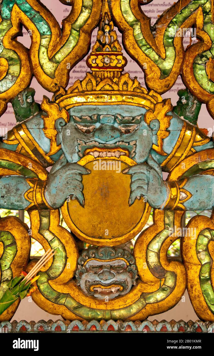 Thailand: A representation of Rahu, Snake Demon and causer of solar and lunar eclipses, Wat Pong Sanuk Tai, Lampang, Lampang Province, northern Thailand.  In Hindu mythology, Rahu is a snake that swallows the sun or the moon causing eclipses. He is depicted in art as a dragon with no body riding a chariot drawn by eight black horses. Rahu is one of the navagrahas (nine planets) in Vedic astrology. The Rahu kala (time of day under the influence of Rahu) is considered inauspicious. Stock Photo