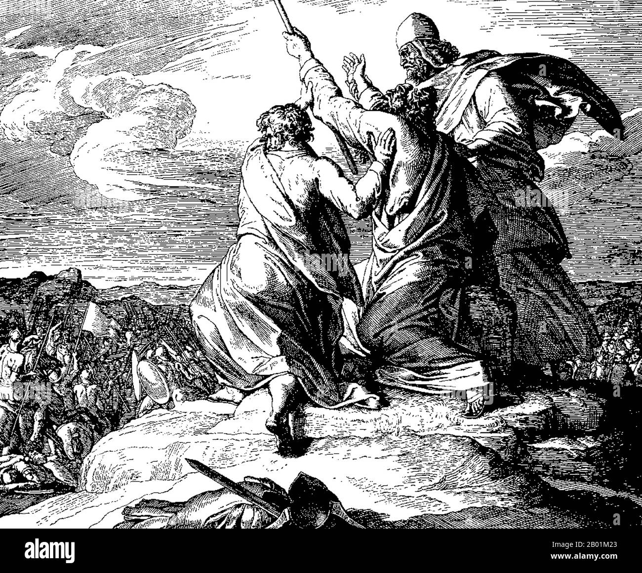 Germany: 'Battle with the Amalekites'. Moses holding up his arms during battle, assisted by Aaron and Hur. Woodcut illustration by Julius Schnorr von Carolsfeld (26 March 1794 - 24 May 1872) for 'Die Bibel in Bildern', c. 1860.  Moses was, according to the Hebrew Bible and Qur'an, a religious leader, lawgiver and prophet, to whom the authorship of the Torah is traditionally attributed. He is the most important prophet in Judaism, and is also considered an important prophet in Christianity and Islam, as well as a number of other faiths. Stock Photo