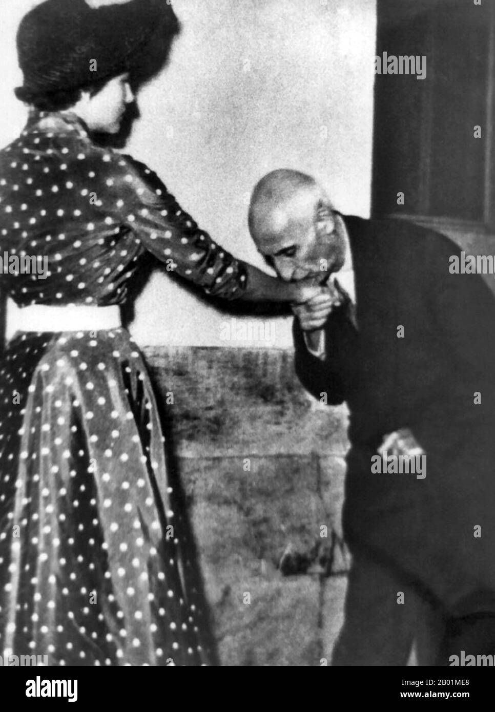 Iran/Persia: Mohammad Mosaddegh or Mosaddeq (16 June 1882 - 5 March 1967), Prime Minister of Iran from 1951-1953, kisses Queen Soraya of Iran's hand in greeting, c. 1951.  The Mossadeq administration introduced a wide range of social reforms but was most notable for its nationalisation of the Iranian oil industry, which had been under British control since 1913 through the Anglo-Persian Oil Company.  Mosaddegh was removed from power in a coup on 19 August 1953, organised and carried out by the United States CIA at the request of British MI6. Stock Photo