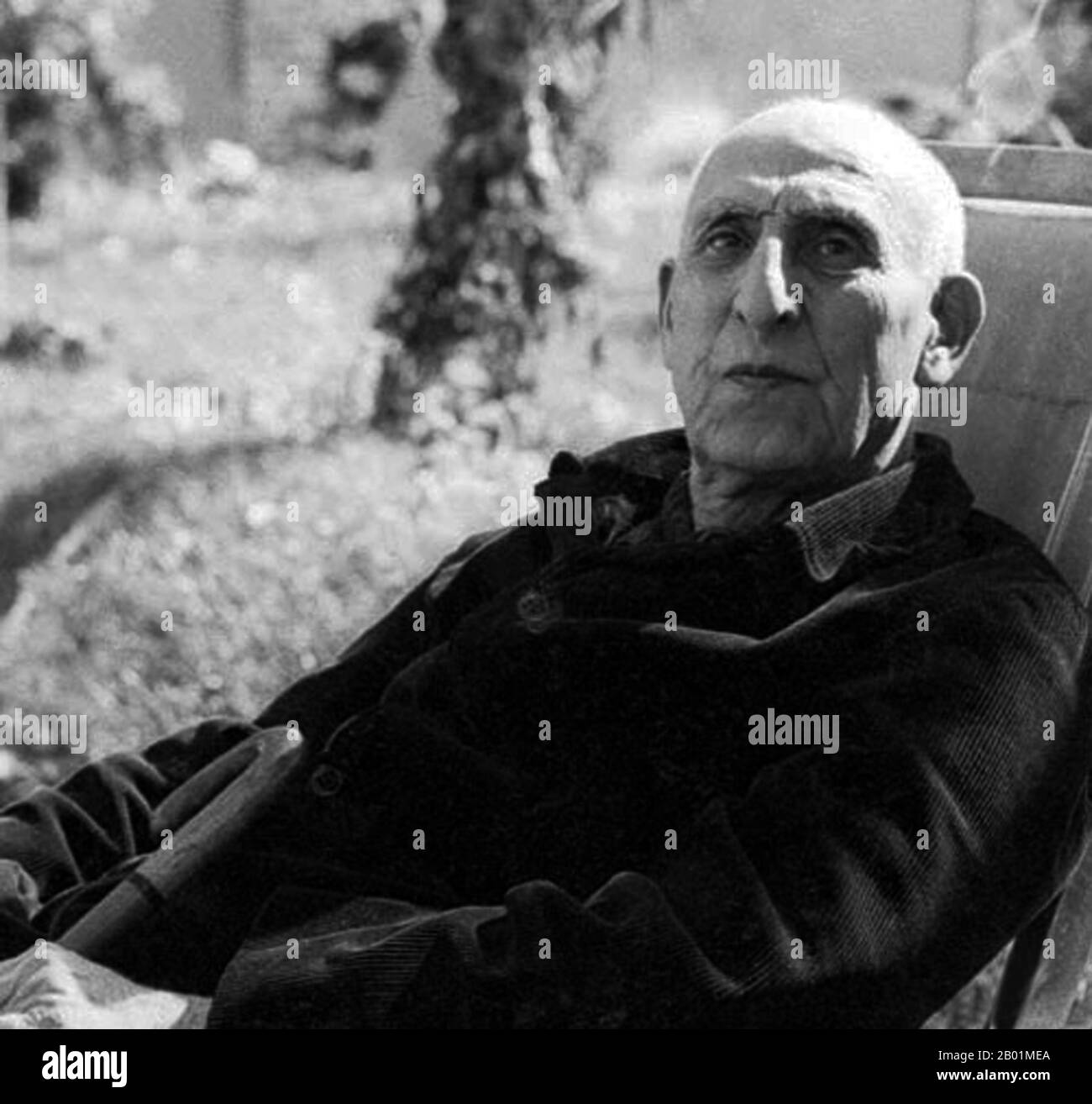 Iran/Persia: Mohammad Mosaddegh or Mosaddeq (16 June 1882 – 5 March 1967), Prime Minister of Iran from 1951 until being overthrown in a coup d'état in 1953. Photo from his time under house arrest, Ahmadabad, c. 1960s.  The Mossadeq administration introduced a wide range of social reforms but was most notable for its nationalisation of the Iranian oil industry, which had been under British control since 1913 through the Anglo-Persian Oil Company.  Mosaddegh was removed from power in a coup on 19 August 1953, organised and carried out by the United States CIA at the request of British MI6. Stock Photo