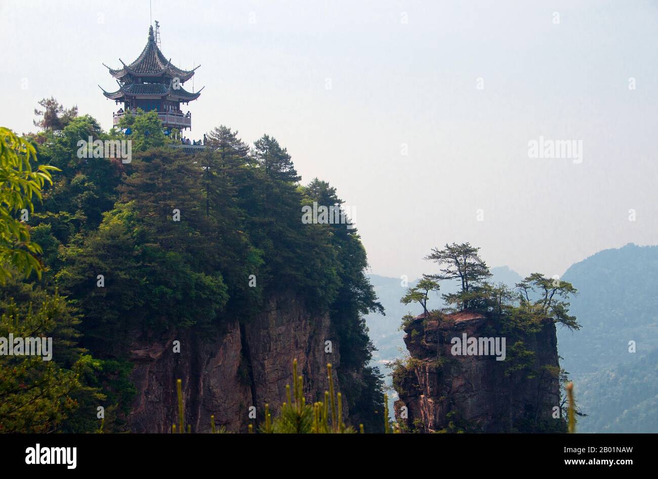China: Six Wonders Pagoda, Wulingyuan Scenic Area (Zhangjiajie), Hunan Province.  Wulingyuan Scenic Reserve is a scenic and historic interest area in Hunan Province. It is noted for its approximately 3,100 tall quartzite sandstone pillars, some of which are over 800 metres (2,600 ft) in height and are a type of karst formation. In 1992 it was designated a UNESCO World Heritage Site. Stock Photo