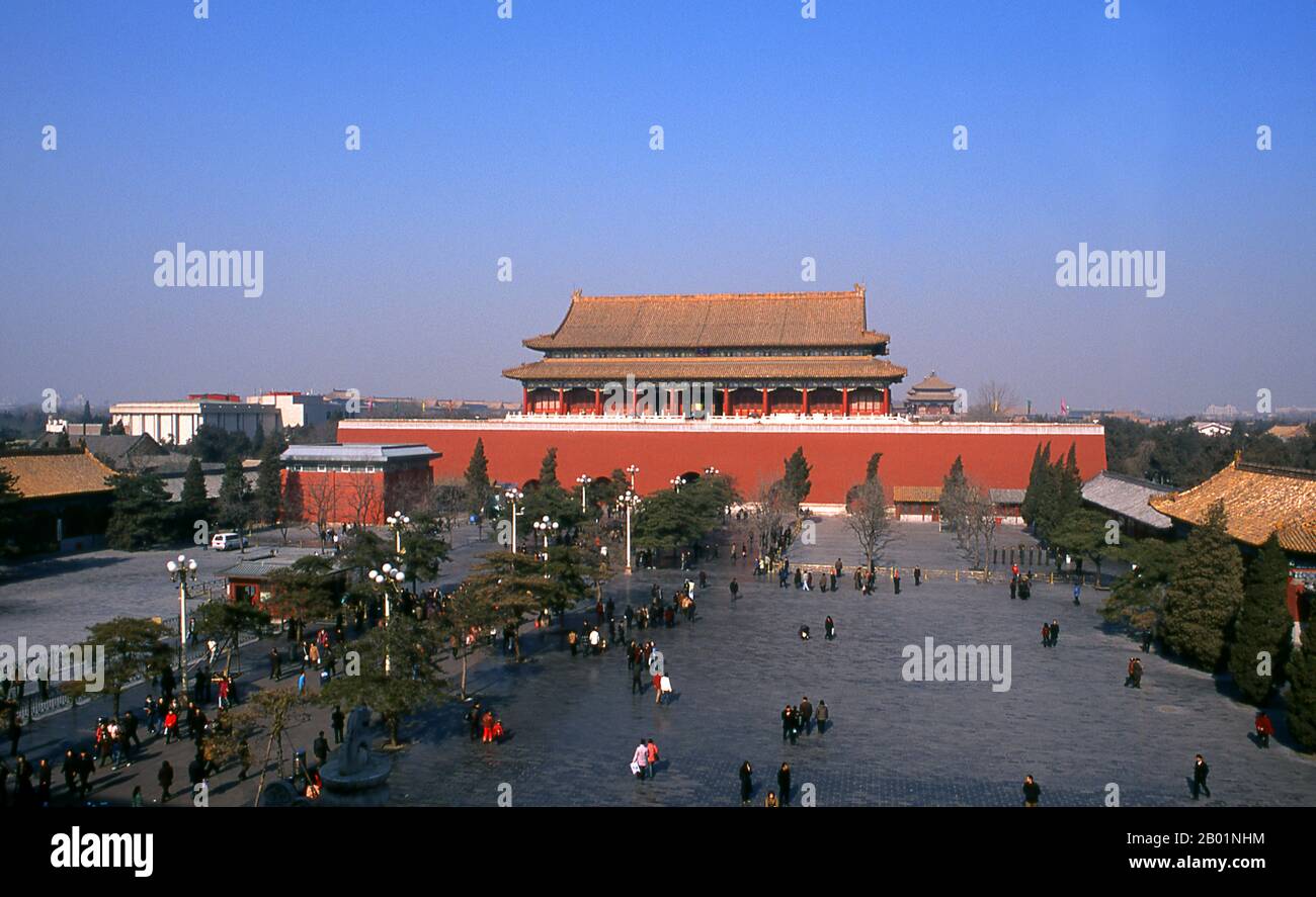 The Duanmen (Upright Gate) sits between Tiananmen (Gate of Heavenly Peace) and Wumen (Meridian Gate), the main entrance to the Forbidden City. The gate was built in 1420 during the Ming Dynasty (1368 - 1644).  The Forbidden City, built between 1406 and 1420, served for 500 years (until the end of the imperial era in 1911) as the seat of all power in China, the throne of the Son of Heaven and the private residence of all the Ming and Qing dynasty emperors. The complex consists of 980 buildings with 8,707 bays of rooms and covers 720,000 m2 (7,800,000 sq ft). Stock Photo