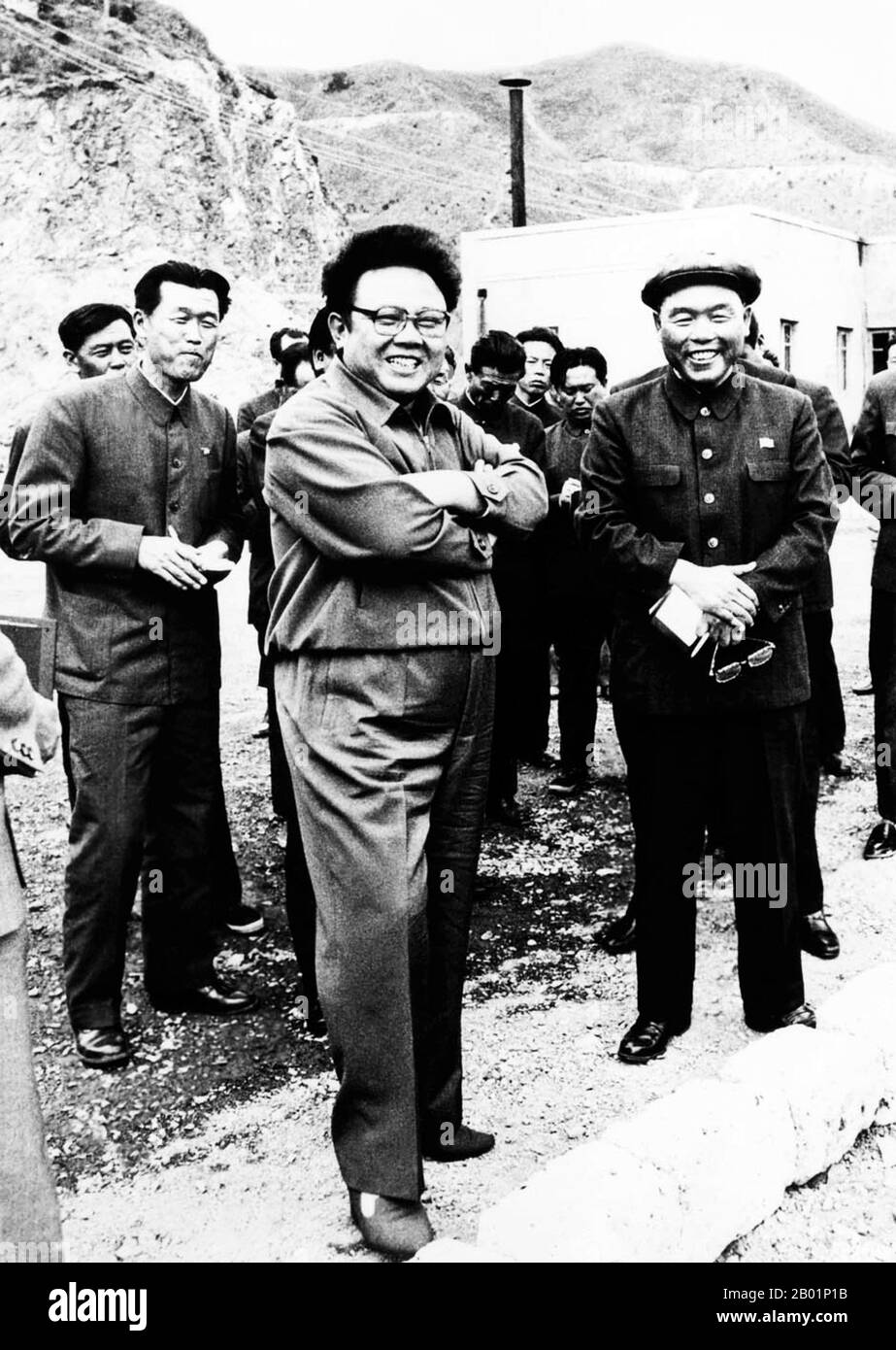 Korea: North Korean leader Kim Jong Il (16 February 1941/1942 - 17 December 2011) on an inspection tour at a mine, two years before succeeding his father, Kim Il Sung, as supreme leader, 1992.  Kim Jong-il was the supreme leader of North Korea (DPRK) from 1994 to 2011. He succeeded his father and founder of the DPRK Kim Il-sung following the elder Kim's death in 1994. Kim Jong-il was the General Secretary of the Workers' Party of Korea, Chairman of the National Defence Commission of North Korea, and the supreme commander of the Korean People's Army, the fourth-largest standing army globally. Stock Photo