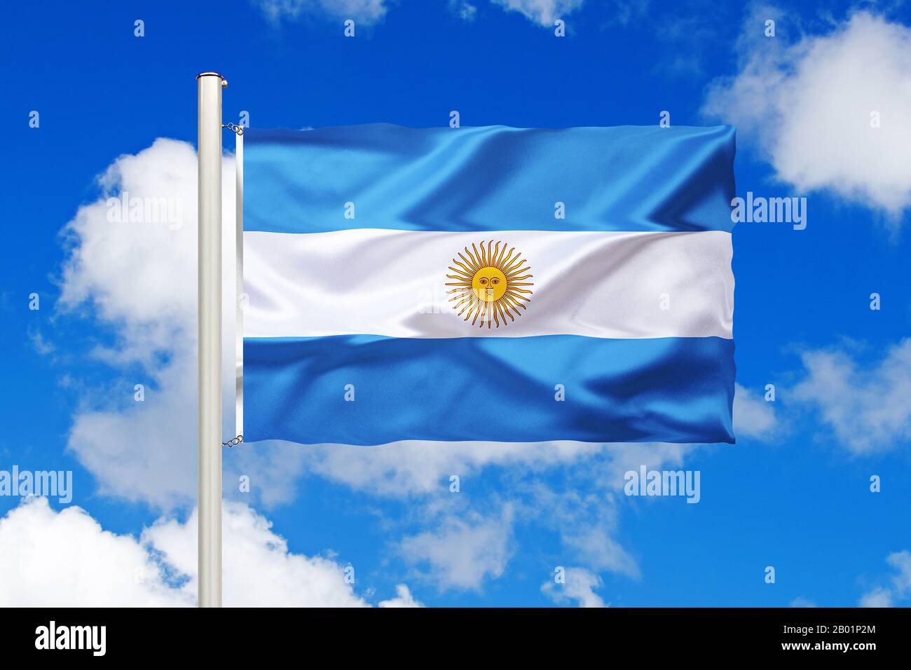 flag of Argentina in front of blue cloudy sky, Argentina Stock Photo