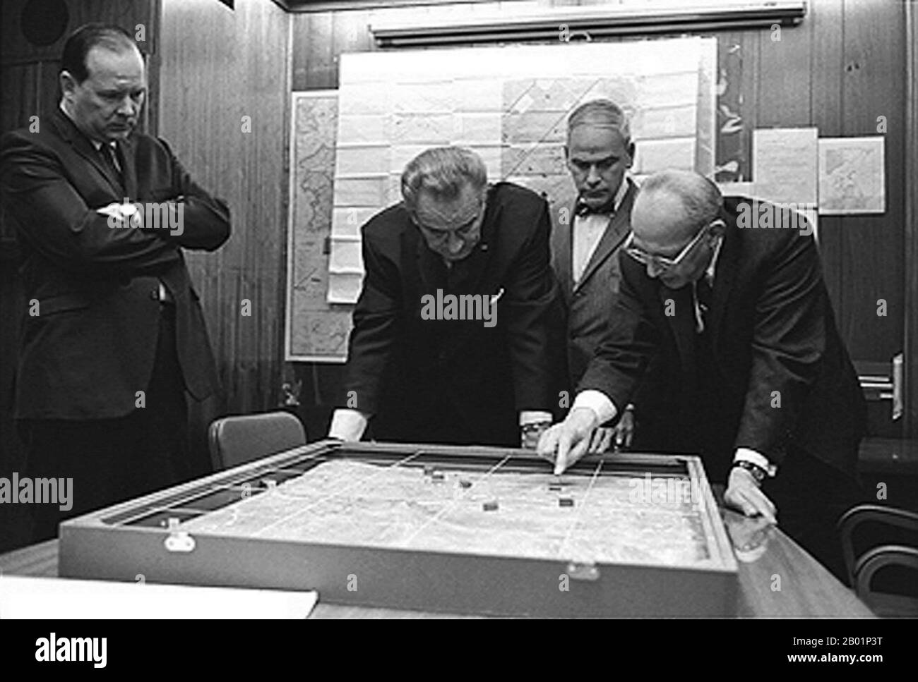 Vietnam/USA:  Walt Rostow showing President Lyndon B. Johnson a model of the Khe Sanh area, 1968  Walt Whitman Rostow (7 October 1916 - 13 February 2003), also known as Walt Rostow or W.W. Rostow, was a United States economist and political theorist who served as Special Assistant for National Security Affairs to U.S. President Lyndon B. Johnson.  Khe Sanh Combat Base was a United States Marine Corps outpost in South Vietnam (MGRS 48QXD850418) used during the Vietnam War. The airstrip was built in September 1962. Fighting began there in late April of 1967 known as the 'Hill Fights'. Stock Photo