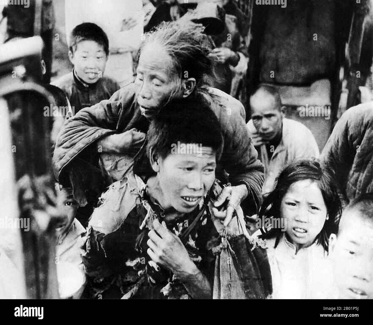 China: Victims of the disastrous Great Chinese Famine produced by the Great Leap Forward (1958-1961). Between 18 and 42 million people died of starvation.  The Great Leap Forward of the People's Republic of China (PRC) was an economic and social campaign of the Communist Party of China (CPC), reflected in planning decisions from 1958 to 1961, which aimed to use China's vast population to rapidly transform the country from an agrarian economy into a modern communist society through the process of rapid industrialisation, and collectivisation. The campaign was spearheaded by Mao Zedong. Stock Photo