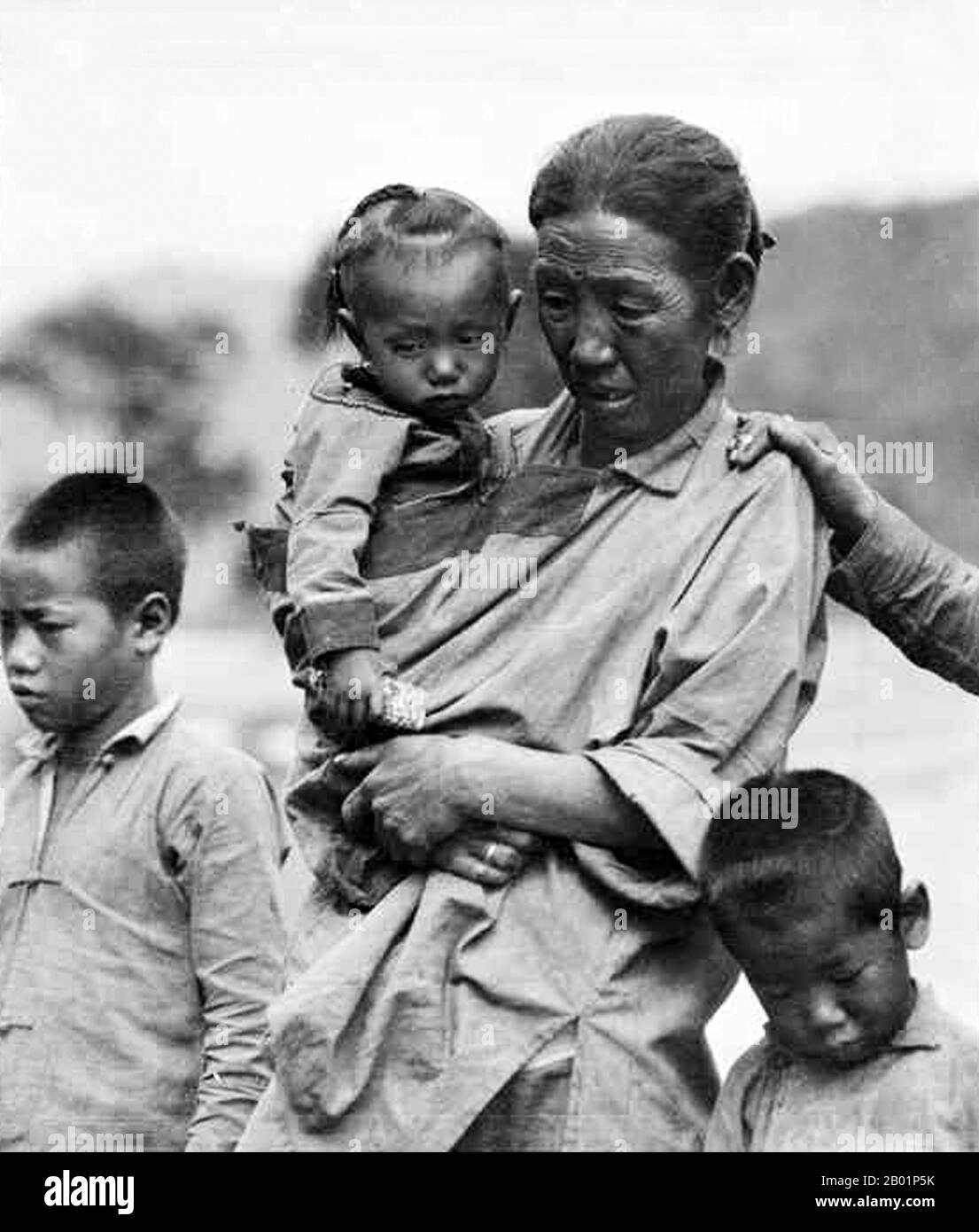 China: Victims of the disastrous Great Chinese Famine produced by the Great Leap Forward (1958-1961). Between 18 and 42 million people died of starvation.  The Great Leap Forward of the People's Republic of China (PRC) was an economic and social campaign of the Communist Party of China (CPC), reflected in planning decisions from 1958 to 1961, which aimed to use China's vast population to rapidly transform the country from an agrarian economy into a modern communist society through the process of rapid industrialisation, and collectivisation. The campaign was spearheaded by Mao Zedong. Stock Photo