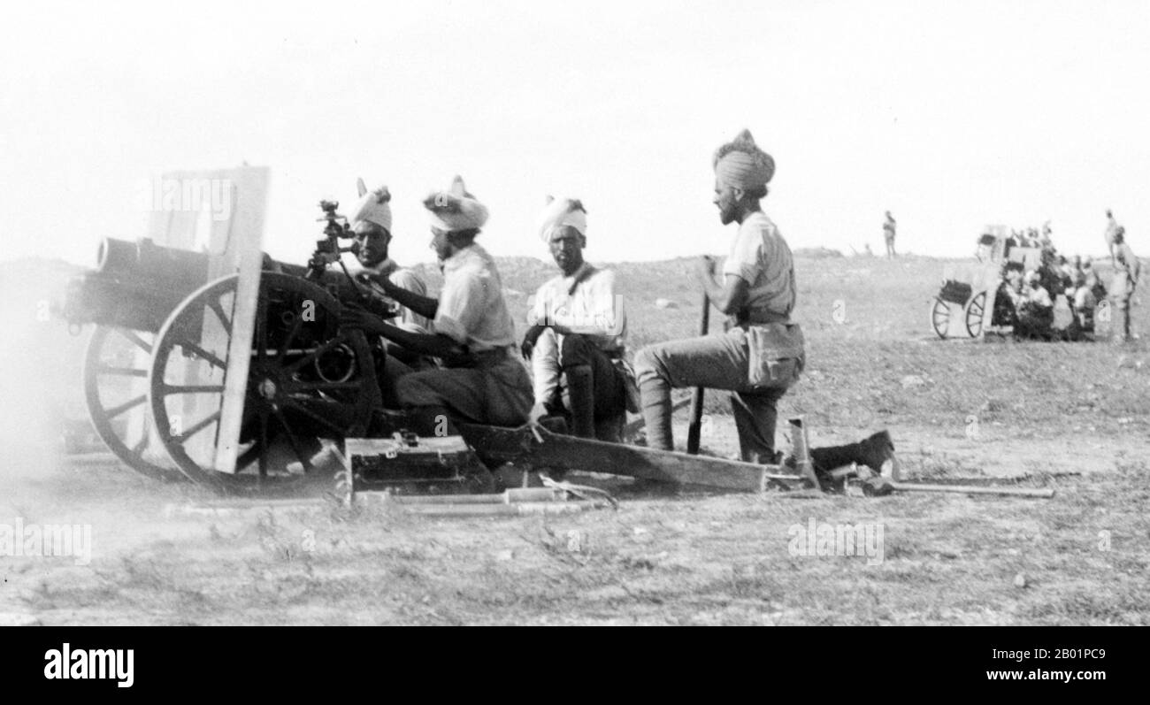 Palestine: British Indian Army troops firing a QF 3.7 inch mountain howitzer gun battery, Jerusalem, 1917.  The Middle Eastern theatre of World War I was the scene of action between 29 October 1914, and 30 October 1918. The combatants were the Ottoman Empire, with some assistance from the other Central Powers, and primarily the British and the Russians among the Allies of World War I. There were five main campaigns: the Sinai and Palestine Campaign, the Mesopotamian Campaign, the Caucasus Campaign, the Persian Campaign, and the Gallipoli Campaign. Stock Photo