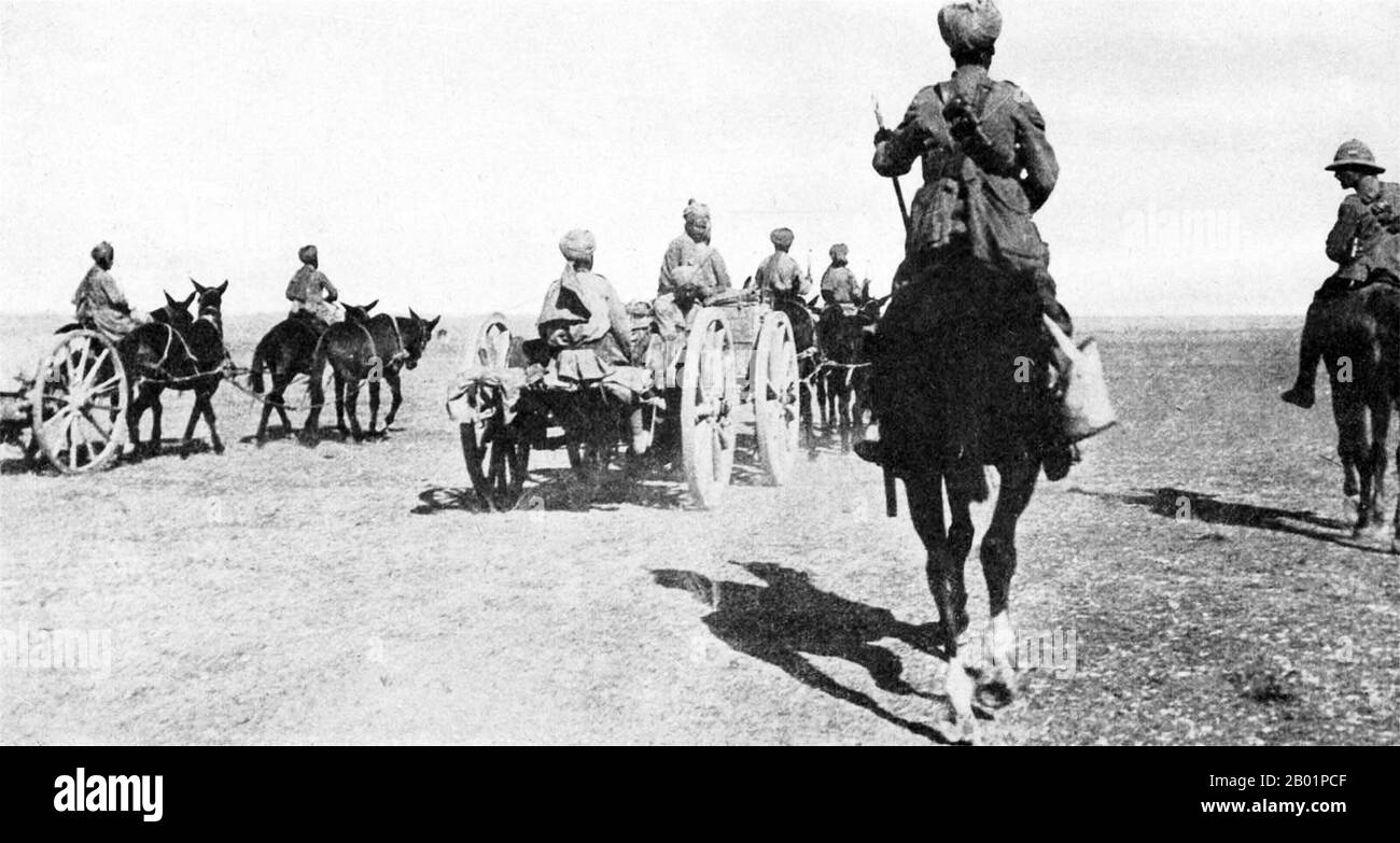 Iraq: Soldiers of the British Indian Army laying military telephone wires, Mesopotamia, 1917.  The Middle Eastern theatre of World War I was the scene of action between 29 October 1914, and 30 October 1918. The combatants were the Ottoman Empire, with some assistance from the other Central Powers, and primarily the British and the Russians among the Allies of World War I. There were five main campaigns: the Sinai and Palestine Campaign, the Mesopotamian Campaign, the Caucasus Campaign, the Persian Campaign and the Gallipoli Campaign. Stock Photo