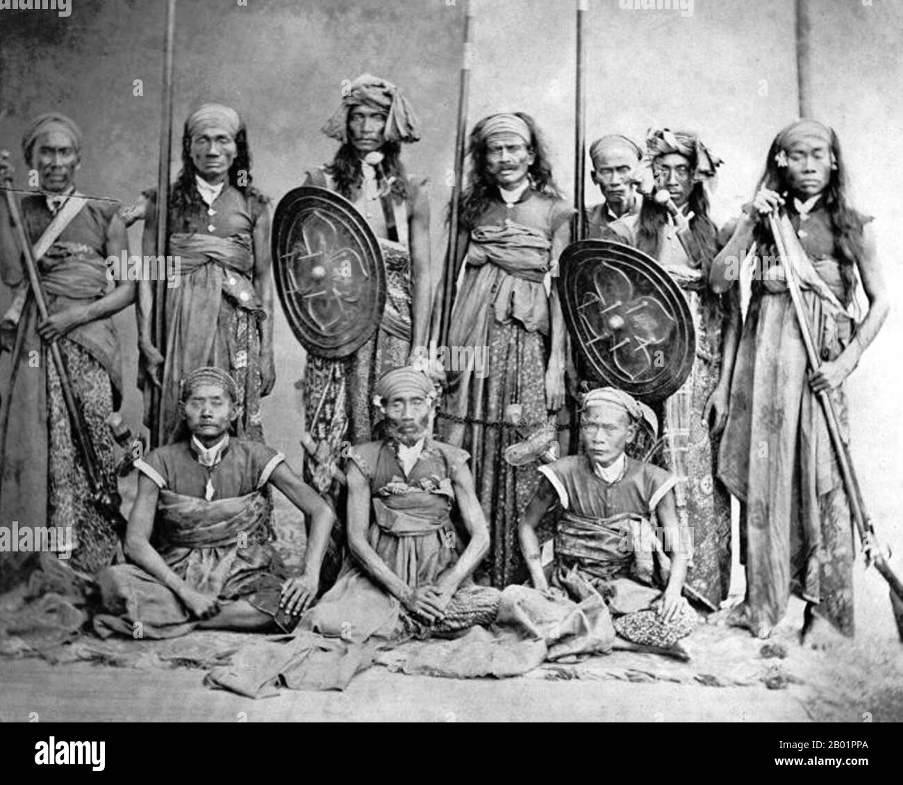 Indonesia: A group of Sasak chiefs on Lombok Island, c. 1870-1890.  The Sasak live mainly on the island of Lombok, Indonesia, numbering around 2.6 million (85% of Lombok's population). They are related to the Balinese in language and race, although the Sasak are predominantly Muslim while the Balinese are Hindu. Stock Photo