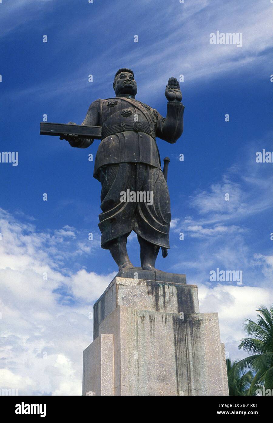 Laos: A Socialist realist-style statue of King Sisavang Vong (14 July 1885 - 29 October 1959) in Vientiane. The statue was a gift from the Soviet Union.  Sisavang Phoulivong (or Sisavangvong) was King of Luang Prabang and later the Kingdom of Laos from 28 April 1904 until his death on 20 October 1959.  His father was King Zakarine and his mother was Queen Thongsy. He was educated at Lycée Chasseloup-Laubat, Saigon, and at l'École Coloniale in Paris. He was known as a 'playboy' king with up to 50 children by as many as 15 wives. Stock Photo