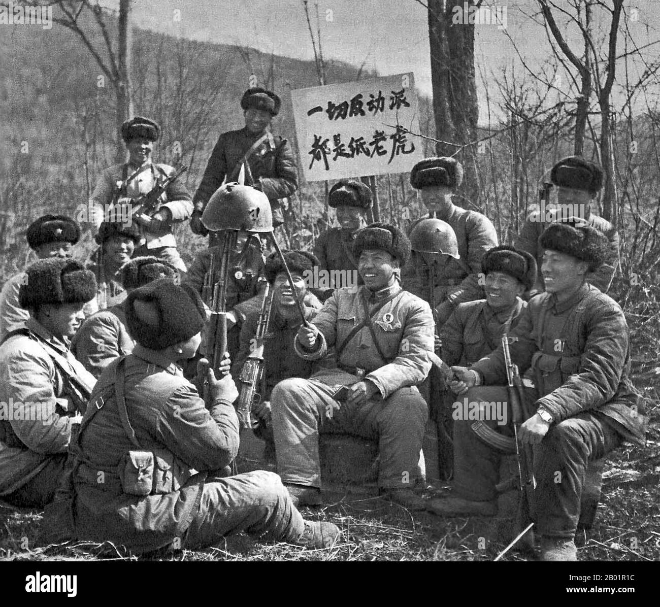 China: Chinese troops on disputed Chenpoo Island hold up Soviet helmets on their bayonet points, 1969.  Down with the New Tsars!: Soviet Revisionists’ Anti-China Atrocities on the Heilung and Wusuli Rivers.  By March 1969, Sino-Russian border rivalries led to the Sino-Soviet border conflict at the Ussuri River and on Damansky-Zhenbao Island; more small-scale warfare occurred at Tielieketi in August. Stock Photo