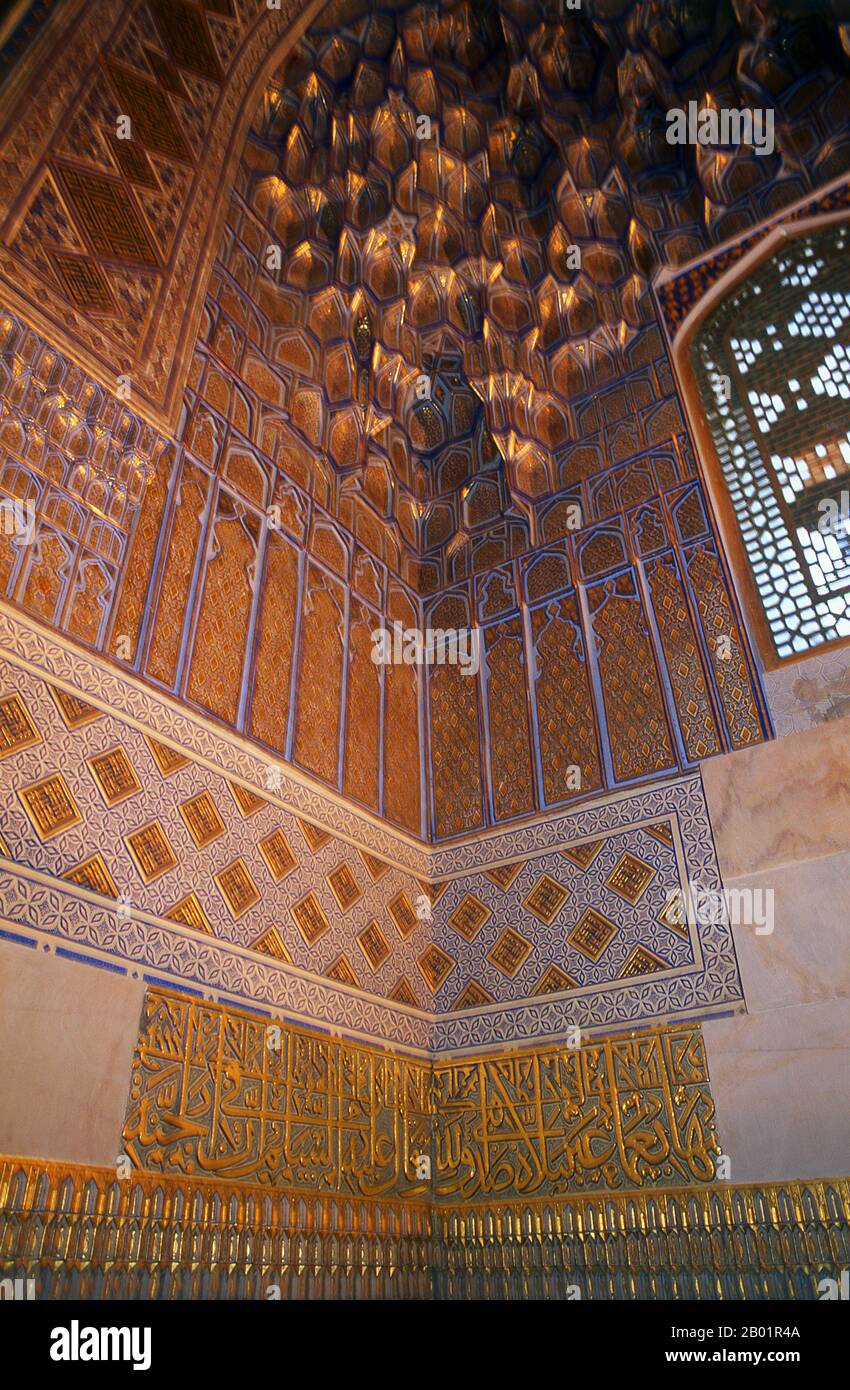 Uzbekistan: Interior detail of mausoleum dome, Gur-e Amir Mausoleum, Samarkand.  The Gūr-e Amīr or Guri Amir is the mausoleum of the Asian conqueror Tamerlane (also known as Timur) in Samarkand, Uzbekistan. Gur-e Amir is Persian for 'Tomb of the King'. It occupies an important place in the history of Persian architecture as the precursor and model for later great Mughal architecture tombs, including Humayun's Tomb in Delhi and the Taj Mahal in Agra, built by Timur's descendants, the ruling Mughal dynasty of North India. It has been heavily restored. Stock Photo