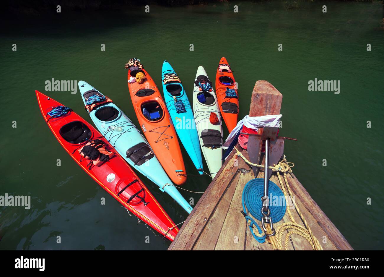 sea kayaks at a lontail boat in the Andaman sea, Thailand, Phuket, Ao Phang Nga National Park Stock Photo