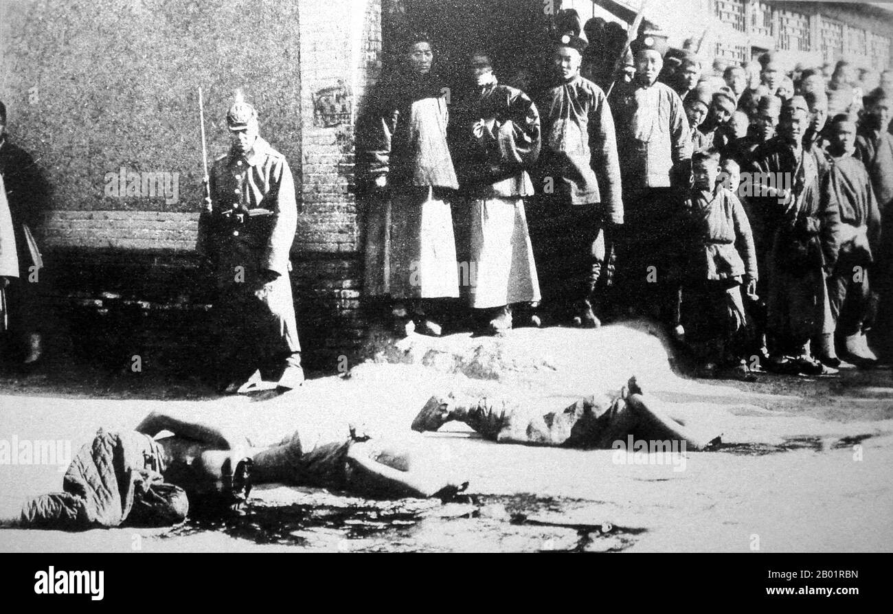 China: Execution of boxer leaders, Hsi-kou, c. 1901.  The Boxer Rebellion, also known as Boxer Uprising or Yihetuan Movement, was a proto-nationalist movement by the Righteous Harmony Society in China between 1898 and 1901, opposing foreign imperialism and Christianity.  The uprising took place in response to foreign spheres of influence in China, with grievances ranging from opium traders, political invasion, economic manipulation, to missionary evangelism. In China, popular sentiment remained resistant to foreign influences, and anger rose over the 'unequal treaties'. Stock Photo