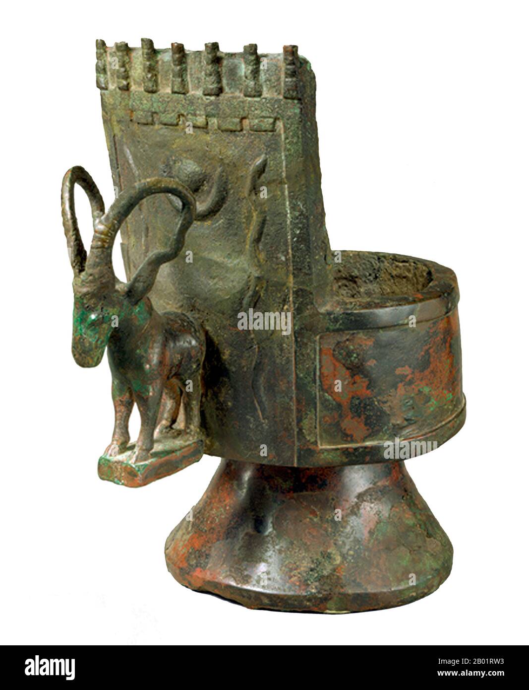 Yemen: An incense burner in bronze decorated with an ibex handle, c. 500 BCE.  Hailing from southwestern Arabia, this bronze incense burner consisted of a cylindrical cup on a conical base. The ibex and snakes on the back of the facade are symbols representing fertility and virility and are often associated with local gods.  Incense - myrrh and frankincense - travelled north along the ancient Incense Roads from Yemen and Oman from early antiquity. Used in worship and to perfume the air, various types of incense burner were used in this process. Stock Photo
