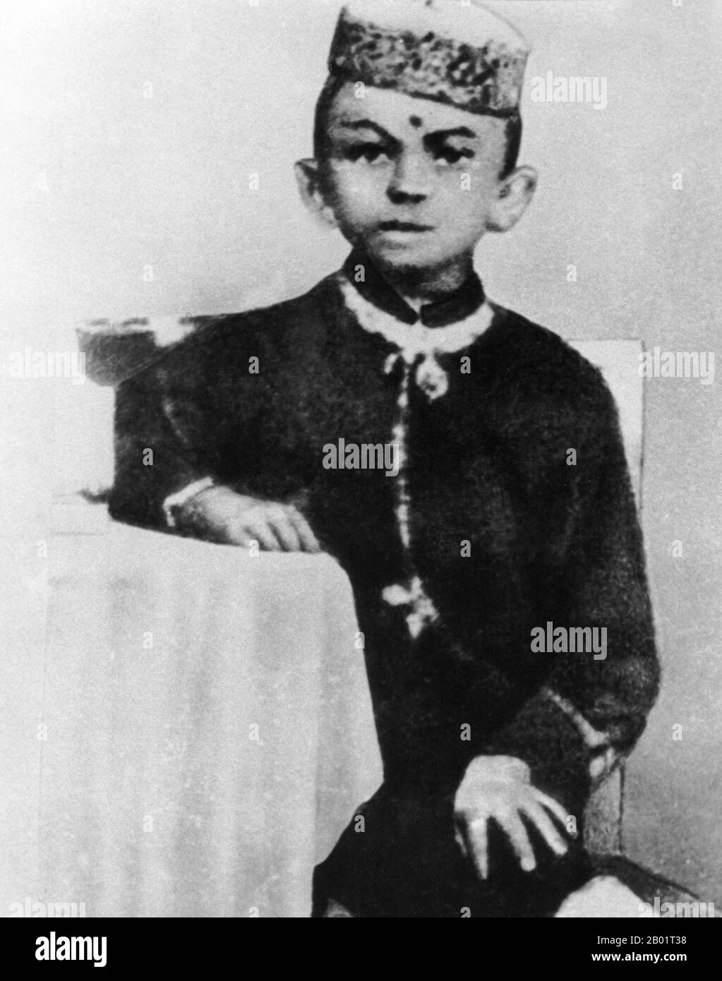 India: Mahatma Gandhi (2 October 1869 - 30 January 1948), preeminent political and ideological leader of India's independence movement, as a child aged 7 years, 1876.  Mohandas Karamchand Gandhi was the preeminent political and ideological leader of India during the Indian independence movement. He pioneered satyagraha. This is defined as resistance to tyranny through mass civil disobedience, a philosophy firmly founded upon ahimsa, or total non-violence. This concept helped India gain independence and inspired movements for civil rights and freedom across the world. Stock Photo