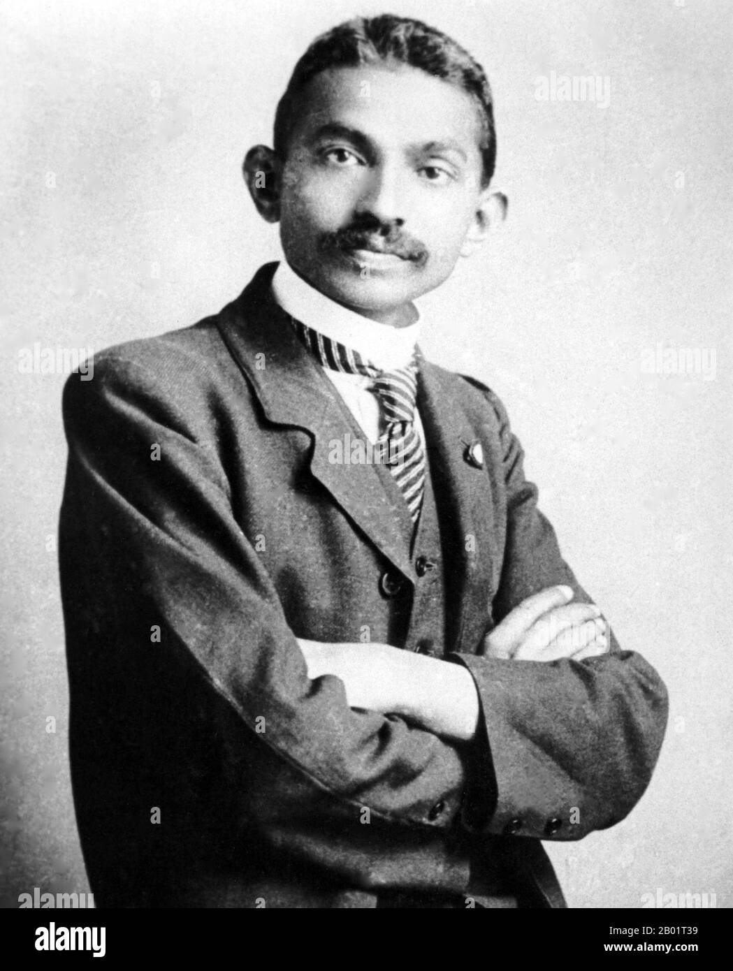India/South Africa: Mahatma Gandhi (2 October 1869 - 30 January 1948), preeminent political and ideological leader of India's independence movement, as a young lawyer in South Africa, 1906.  Mohandas Karamchand Gandhi was the preeminent political and ideological leader of India during the Indian independence movement. He pioneered satyagraha. This is defined as resistance to tyranny through mass civil disobedience, a philosophy firmly founded upon ahimsa, or total non-violence. This concept helped India gain independence and inspired movements for civil rights and freedom across the world. Stock Photo