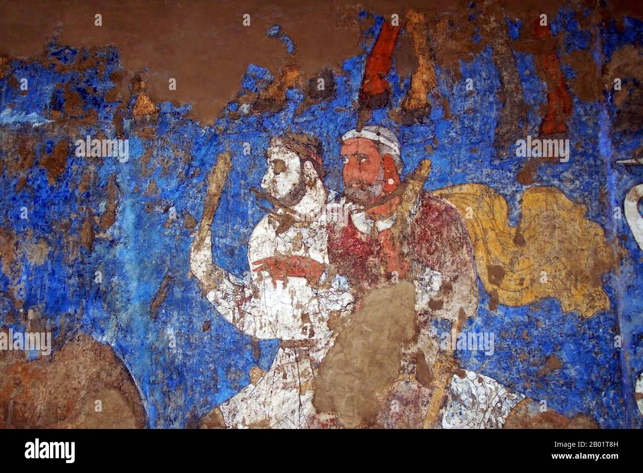 Uzbekistan: Riders. Detail from a section of the Afrasiab Murals, c. 850 CE.  The Afrasiab painting is a rare example of Sogdian art. It was discovered in 1965 when the local authorities decided on the construction of a road through the middle of Afrāsiāb mound, the old site of pre-Mongol Samarkand. It is now preserved in a special museum on the Afrāsiāb mound. It is the main painting we have of ancient Sogdian art.  The painting dates back to the middle of the 7th century CE. Stock Photo