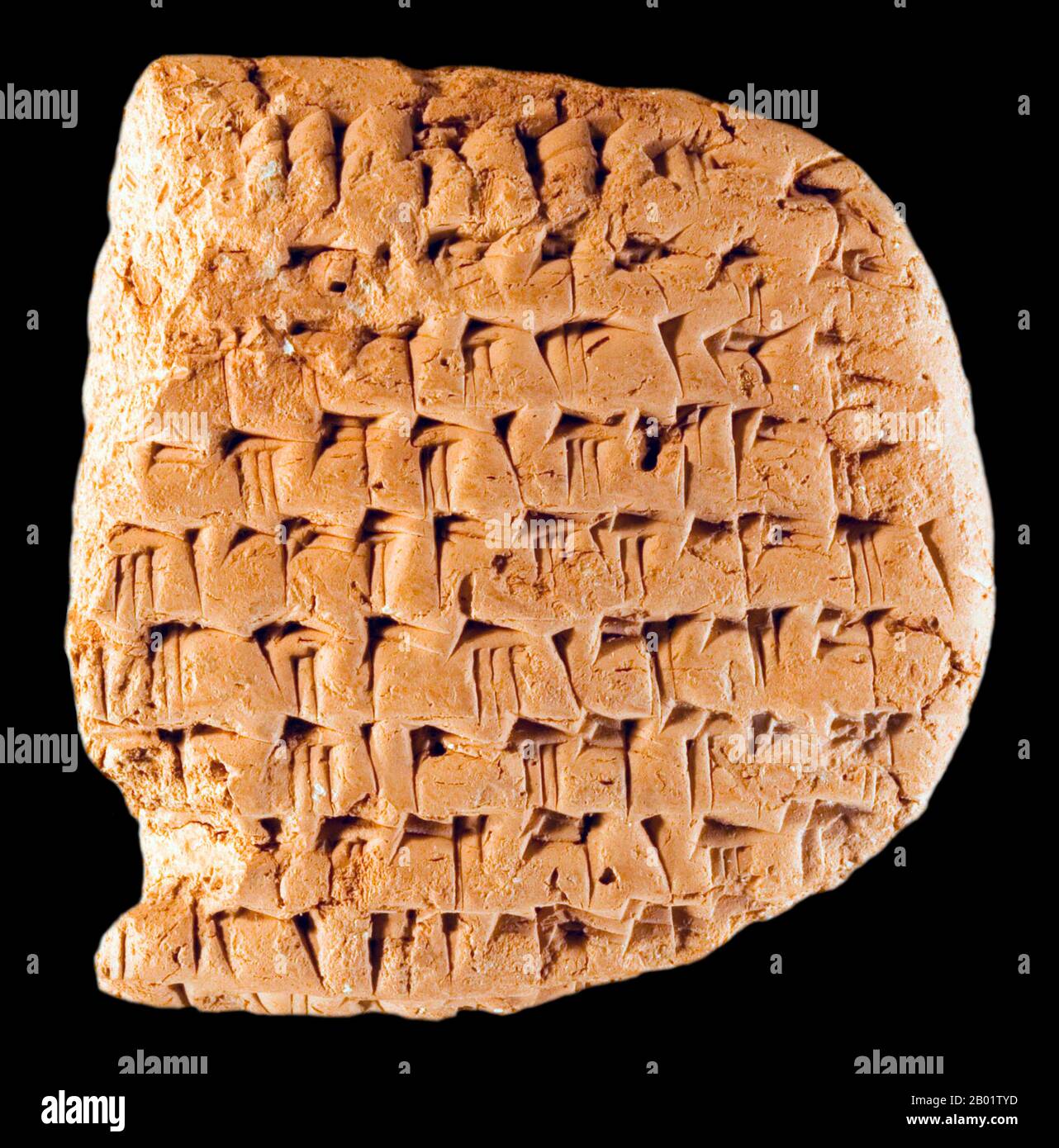 Iran/Persia: A tablet from the Persepolis Fortification Archive, 509-493 BCE. Photo by اردشیر خسروی (CC BY-SA 4.0 License).  The Persepolis Fortification Archive and Persepolis Treasury Archive are two groups of clay administrative archives - sets of records physically stored together - found in Persepolis (Old Persian: Pârsa, Modern Takht-e Jamshid in Fars near Shiraz in southwestern Iran) dating to the Persian Achaemenid Empire.  The discovery was made during legal excavations conducted by the archaeologists from the Oriental Institute of the University of Chicago in the 1930s. Stock Photo
