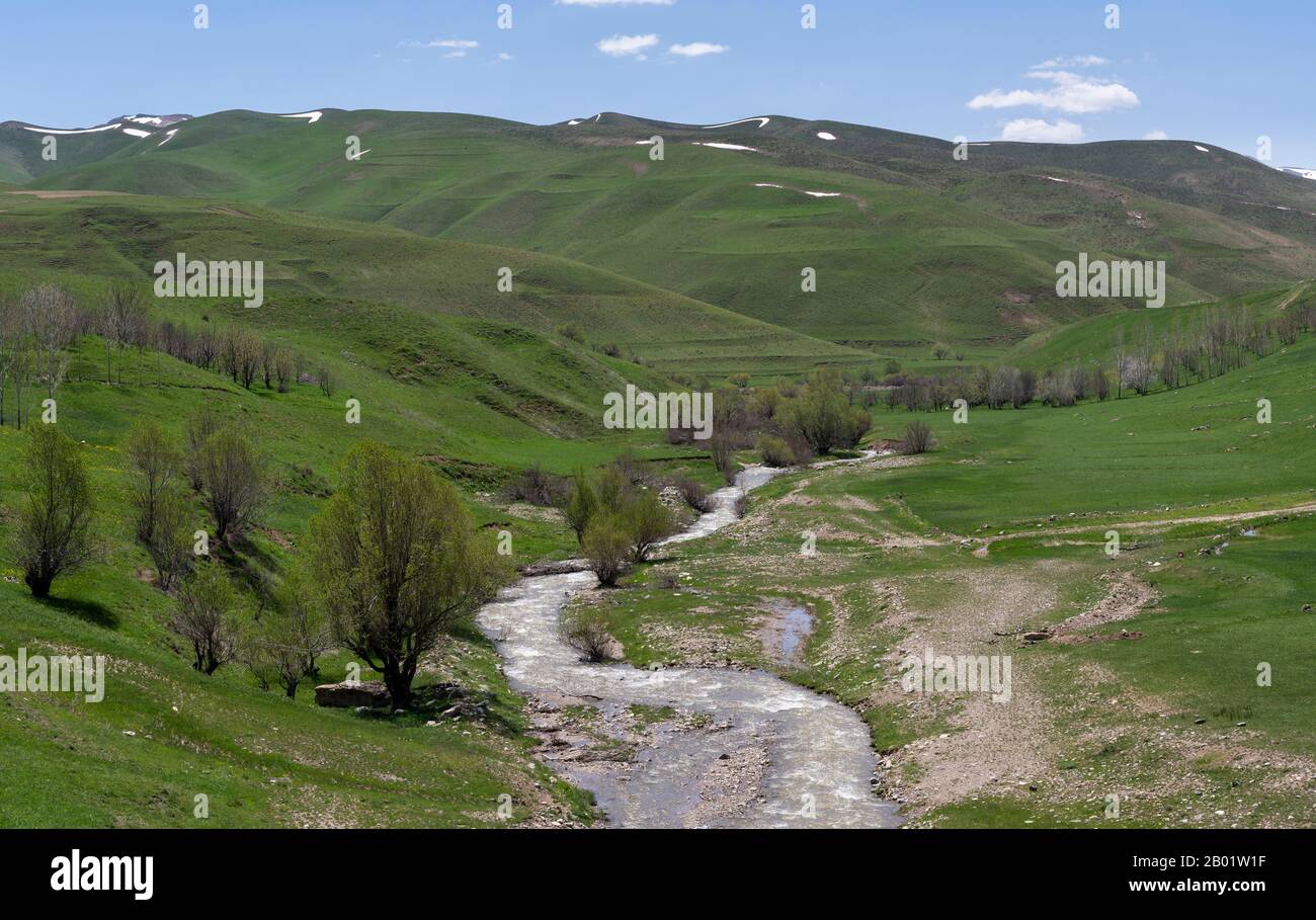 River at Baba Nazar in Iran during springtime with hills and green ...