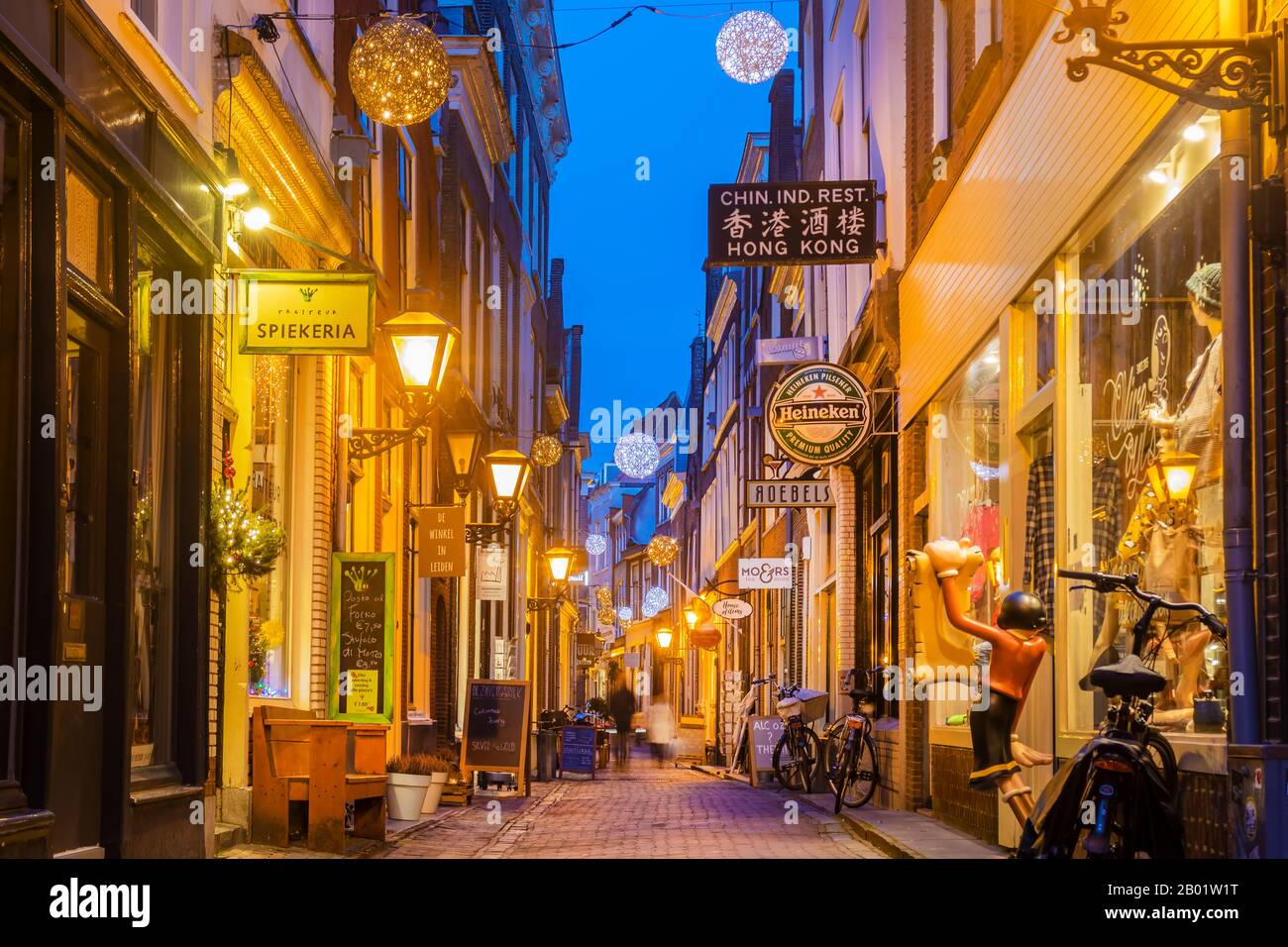 Leiden, The Netherlands - January 16, 2020: Colorful shopping street with christmas decoration in the ancient city center of Leiden, The Netherlands Stock Photo