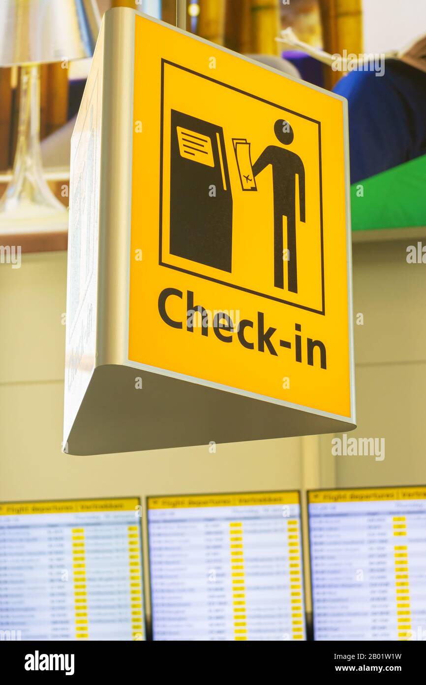 Schiphol, The Netherlands - January 16, 2020: Dutch yellow airport check-in sign on Schiphol Airport, The Netherlands Stock Photo