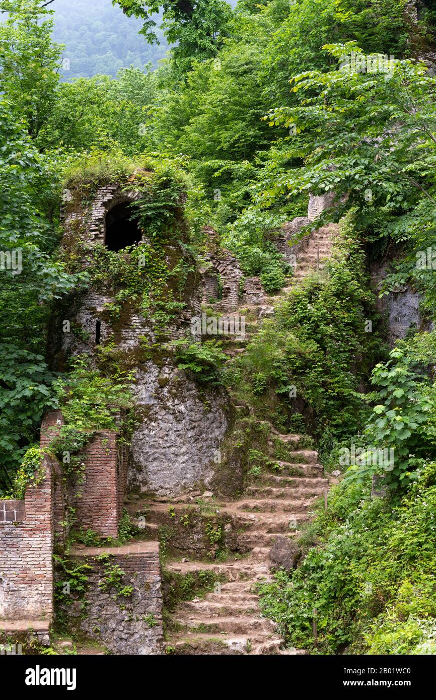 Castle Qaleh Rudkhan in Iran with walls, stairs and tower in a green