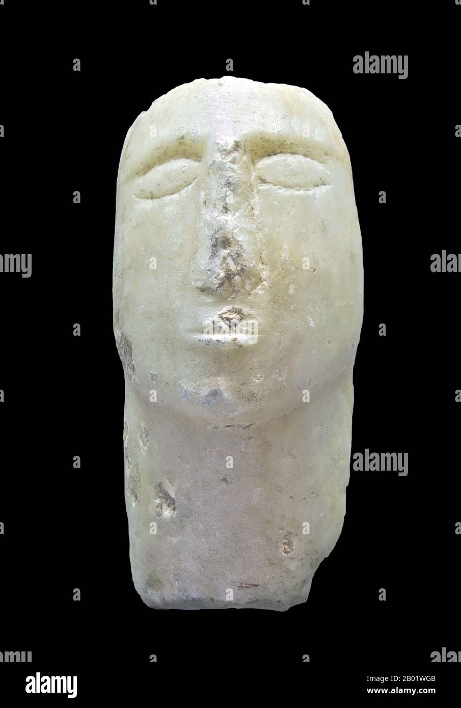 Yemen: Alabaster head from ancient Southern Arabia, 3rd-1st century BCE.  South Arabia as a general term refers to several regions as currently recognised, in chief the Republic of Yemen; yet it has historically also included Najran, Jizan and Asir which are presently in Saudi Arabia, and Dhofar presently in Oman. The frontiers of South Arabia as linguistically conceived would include the historic peoples speaking the related South Arabian languages as well as neighboring dialects of Arabic, and their descendants. Anciently there was a South Arabian alphabet, which was borrowed by Ethiopia. Stock Photo