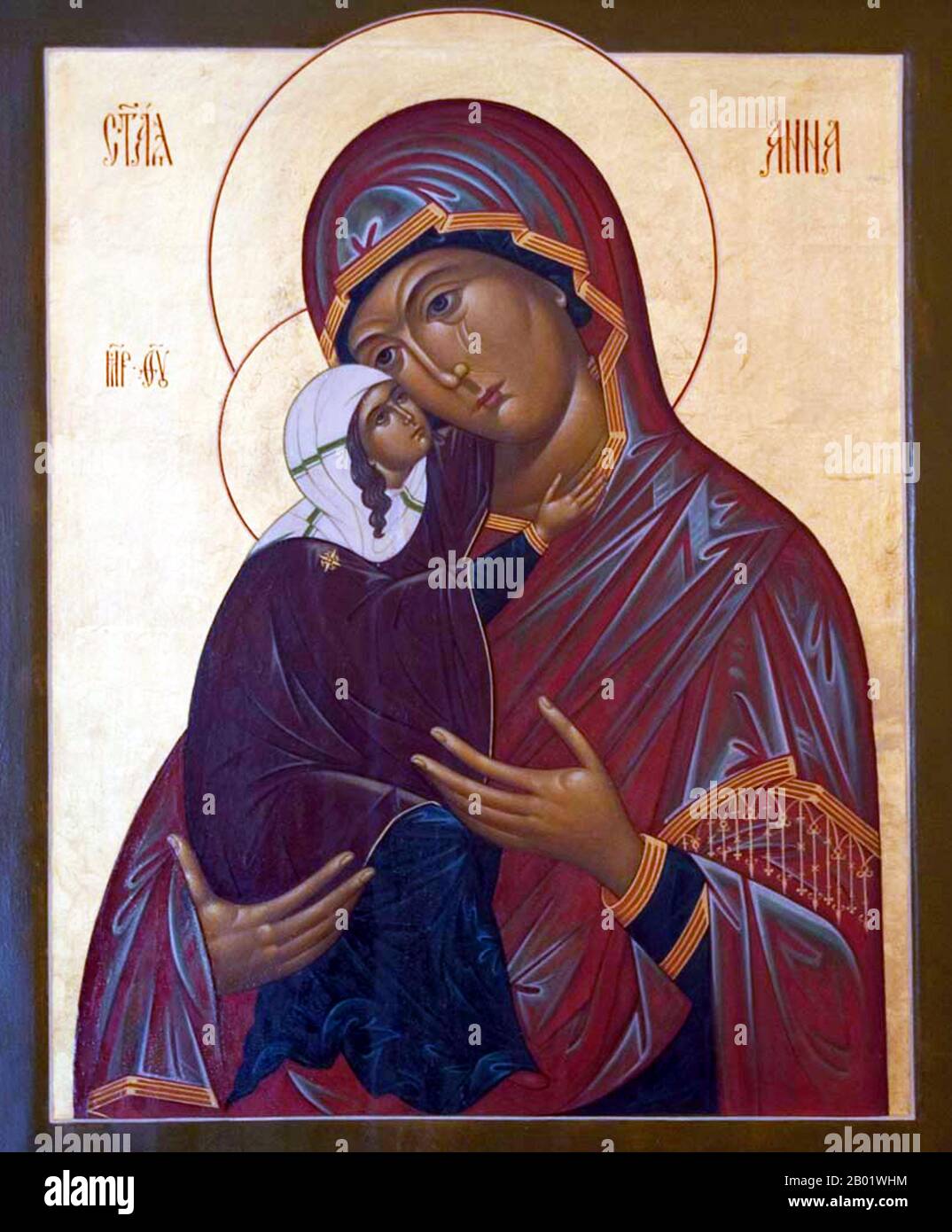 USA: Myrrh-streaming icon of St. Anna, mother of the Holy Virgin Mary, Russian Orthodox Church of Our Lady of Joy of All Who Sorrow, Philadelphia.  Saint Anne (also Ann or Anna, from Hebrew Hannah, meaning 'favour' or 'grace') of David's house and line, was the mother of the Virgin Mary and grandmother of Jesus Christ according to Christian and Islamic tradition.  The English name Anne is derived from Greek rendering of her Hebrew name Hannah. Mary's mother is not named in the canonical gospels or the Qur'an, and her name and that of her husband Joachim come only from New Testament apocrypha. Stock Photo