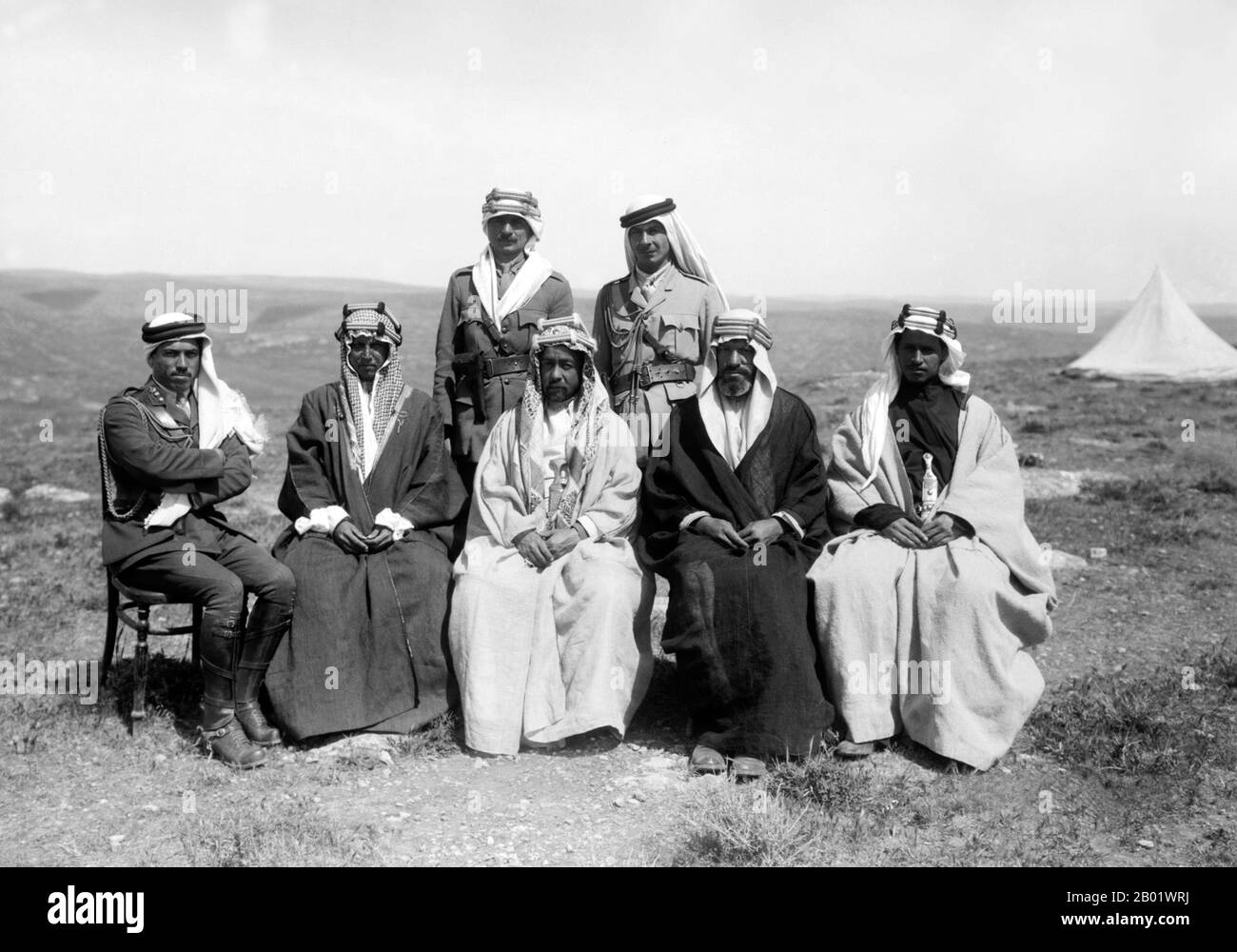 Jordan: Emir Abdullah I (February 1882 - 20 July 1951), King of Jordan (r. 1921-1946), centre, with Emir Shakir to the right, April 1921.  Abdullah I bin al-Hussein (Abd Allāh ibn al-Husayn), King of Jordan, was the second of three sons of Sherif Hussein bin Ali, Sharif and Emir of Mecca.  He was educated in Istanbul, Turkey and Hijaz. From 1909 to 1914, Abdullah sat in the Ottoman legislature, as deputy for Mecca, but allied with Britain during World War I. Between 1916 to 1918, working with the British guerrilla leader T. E. Lawrence, he played a key role in planning the Great Arab Revolt. Stock Photo