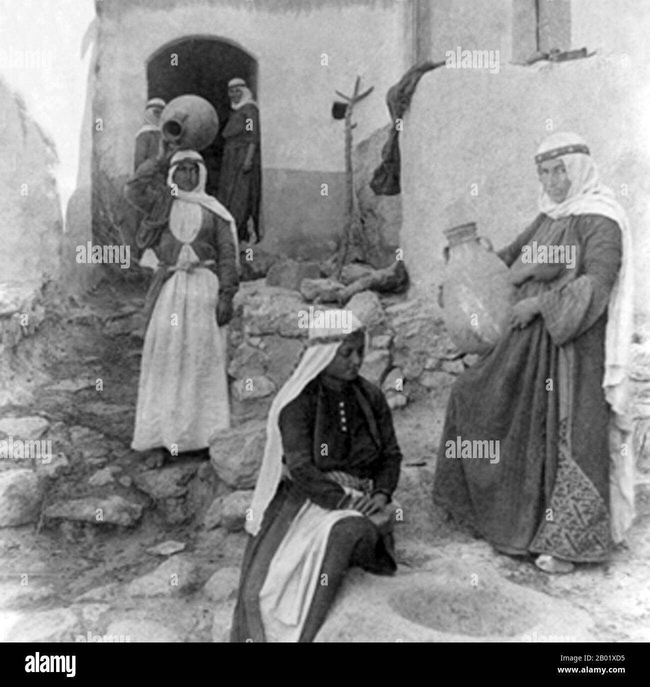 Palestine: Druze women, village of Dalieh, Mount Carmel, c. 1900.  Palestine is a name given to the geographic region between the Mediterranean Sea and the Jordan River. The region is also known as the Land of Israel, the Holy Land and the Southern Levant.  In 1832 Palestine was conquered by Muhammad Ali's Egypt, but in 1840 Britain intervened and returned control of the Levant to the Ottomans in return for further capitulations. The end of the 19th century saw the beginning of Zionist immigration and the Revival of the Hebrew language. Stock Photo