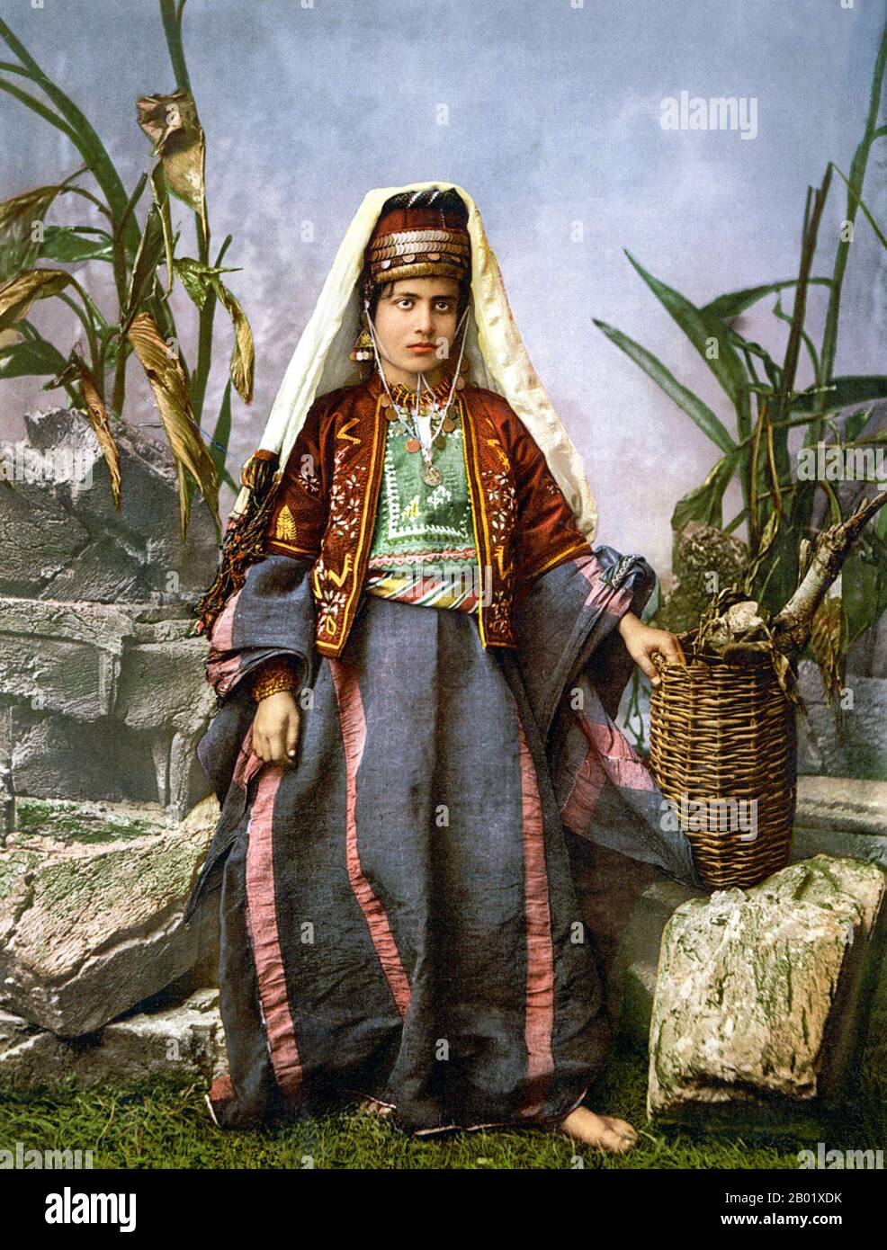 Palestine: A young Palestinian woman of Bethlehem. Photo by Félix Bonfils (8 March 1831 - 9 April 1885), c. 1870s-1880s.  Palestine is a name given to the geographic region between the Mediterranean Sea and the Jordan River. The region is also known as the Land of Israel, the Holy Land and the Southern Levant.  In 1832 Palestine was conquered by Muhammad Ali's Egypt, but in 1840 Britain intervened and returned control of the Levant to the Ottomans in return for further capitulations. The end of the 19th century saw the beginning of Zionist immigration and the Revival of the Hebrew language. Stock Photo