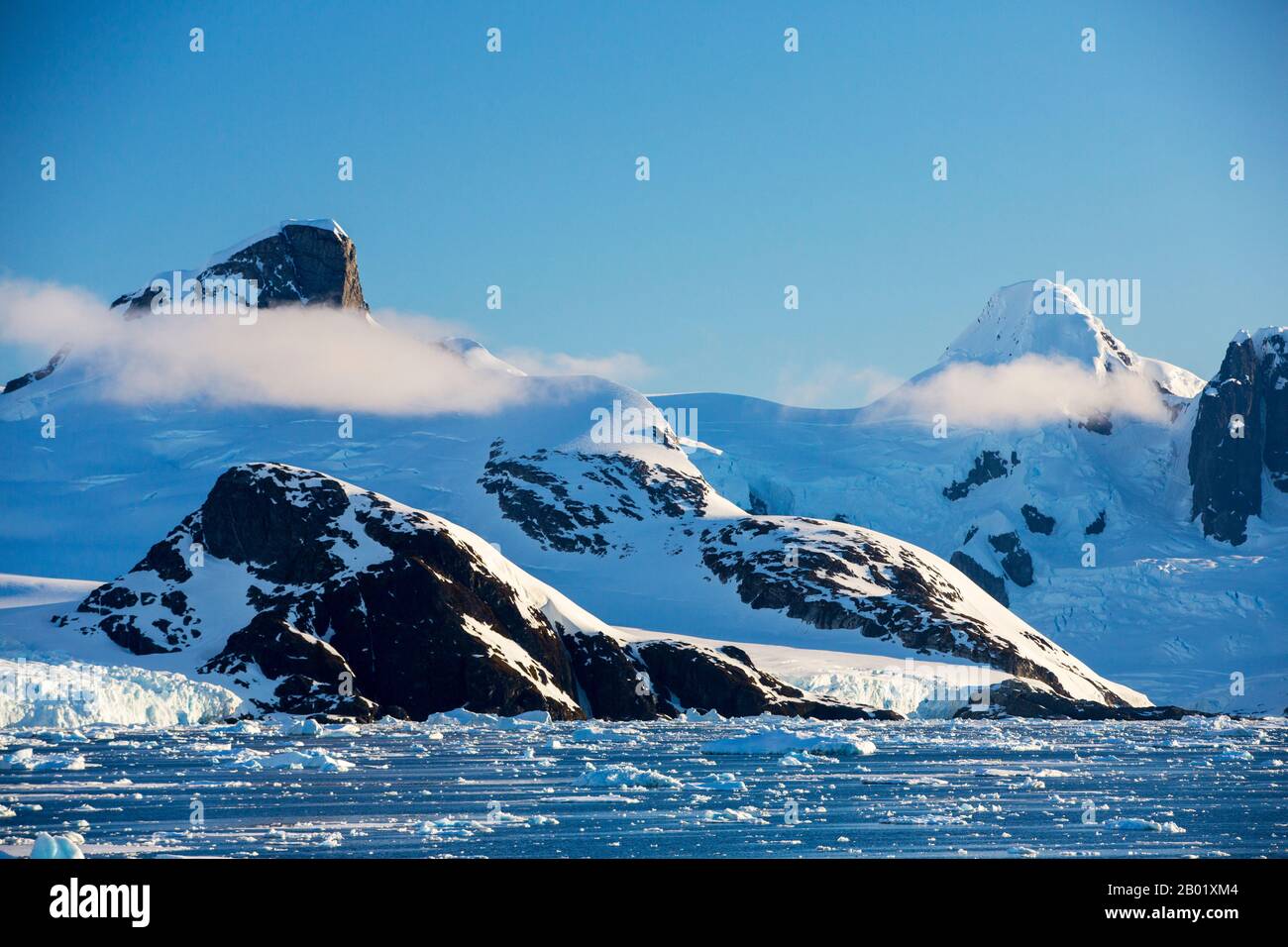 Antarctic scenery surrounding the Lemaire channel, between Booth Island ...