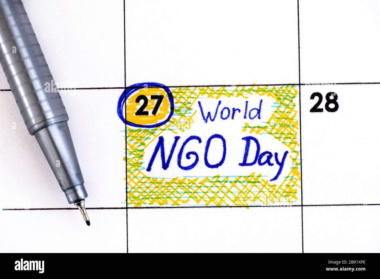 Reminder World NGO Day in calendar with pen. February 27. Stock Photo