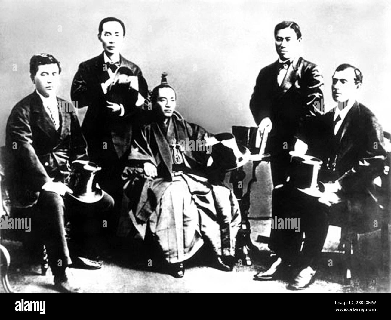 Japan: Members of the Iwakura Mission in San Francisco, 1873. The leader of the mission, Iwakura Tomomi, seated centre.  The Iwakura Mission or Iwakura Embassy was a Japanese diplomatic journey around the world, initiated in 1871 by the oligarchs of the Meiji period. Although it was not the only such 'mission', it is the most well-known and possibly most important for the modernisation of Japan after a long period of isolation from the West. It was first proposed by the influential Dutch missionary and engineer Guido Verbeck and was probably based on the model of the Grand Embassy of Peter I. Stock Photo