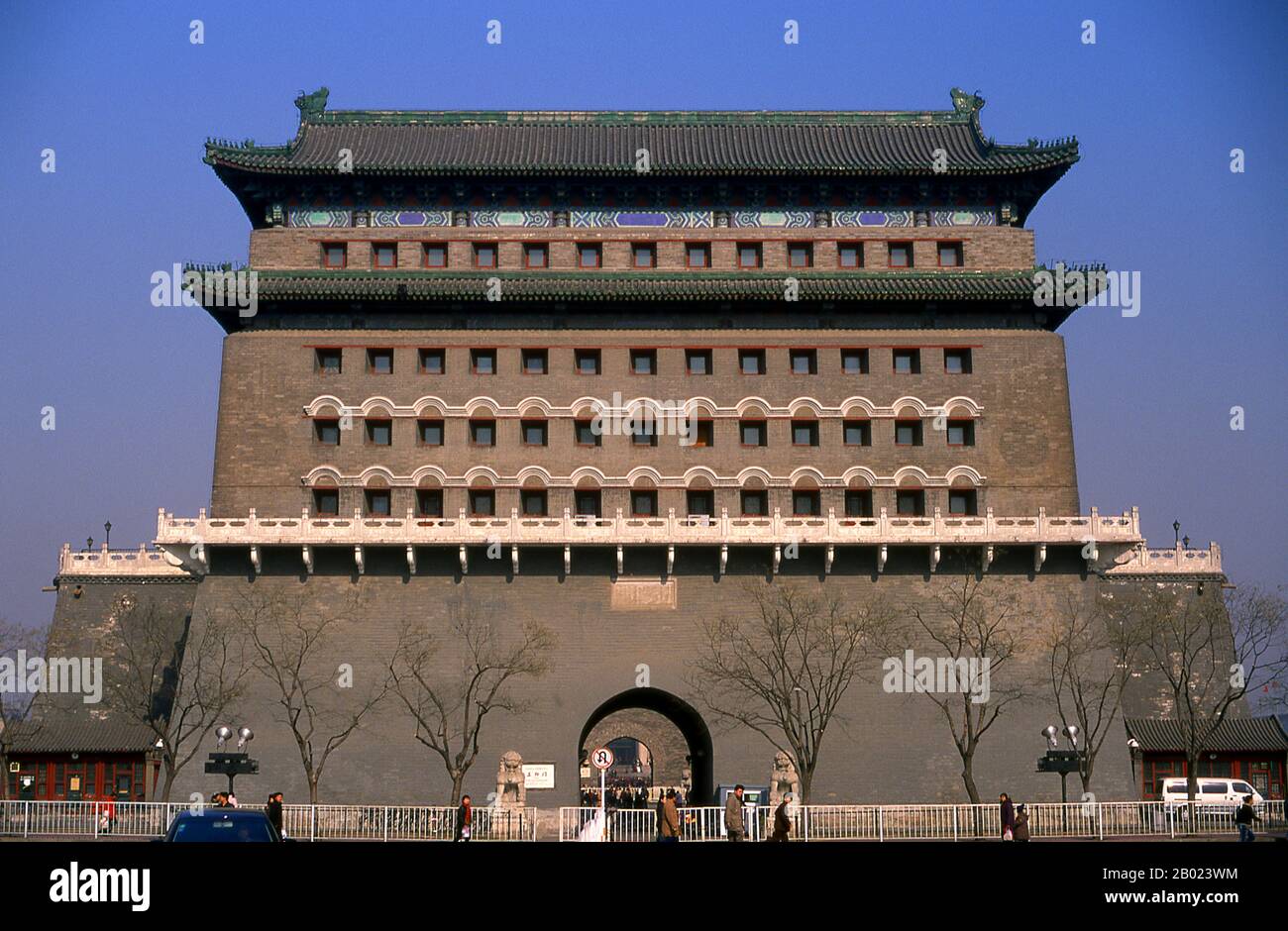 Zhengyangmen was first built in 1419 during the Ming Dynasty and once consisted of the gatehouse proper and an archery tower, which were connected by side walls and together with side gates, formed a large barbican. The gate guarded the direct entry into the imperial city.  During the Boxer Rebellion of 1900, the gate sustained considerable damage when the Eight-Nation Alliance invaded the city. The gate complex was extensively reconstructed in 1914. The Barbican side gates were torn down in 1915.  After the Communist victory in 1949, the Zhengyangmen gatehouse was occupied by the Beijing garr Stock Photo