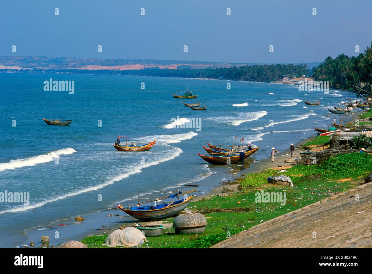 Mui Ne is famous for its production of nuoc mam (Vietnamese fish sauce). Large jars full of the sauce can be seen along the coast around Mui Ne. The sauce is left to ferment in the sun for a number of months. Stock Photo